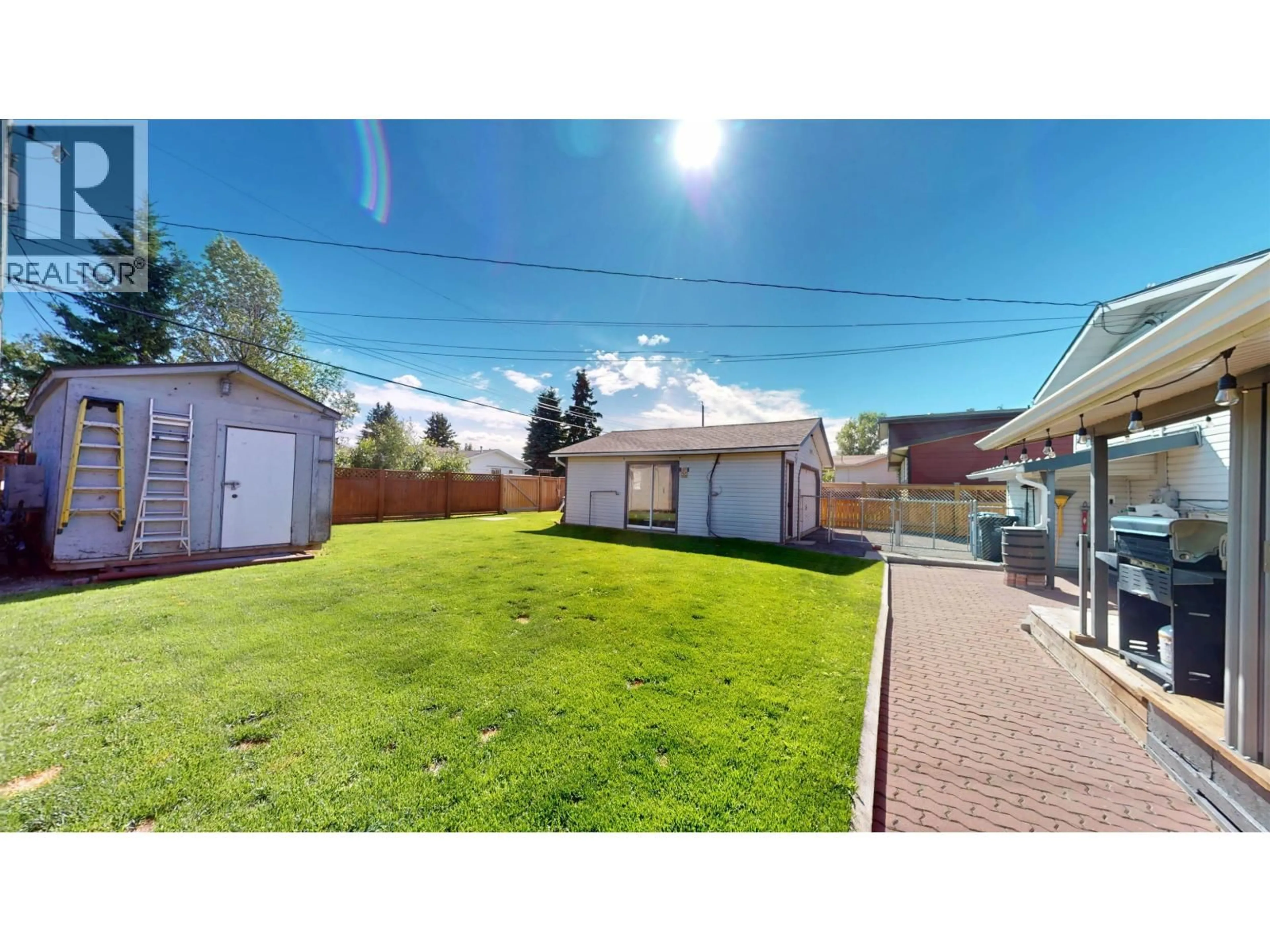 A pic from outside/outdoor area/front of a property/back of a property/a pic from drone, street for 9419 106 AVENUE, Fort St. John British Columbia V1J5L4