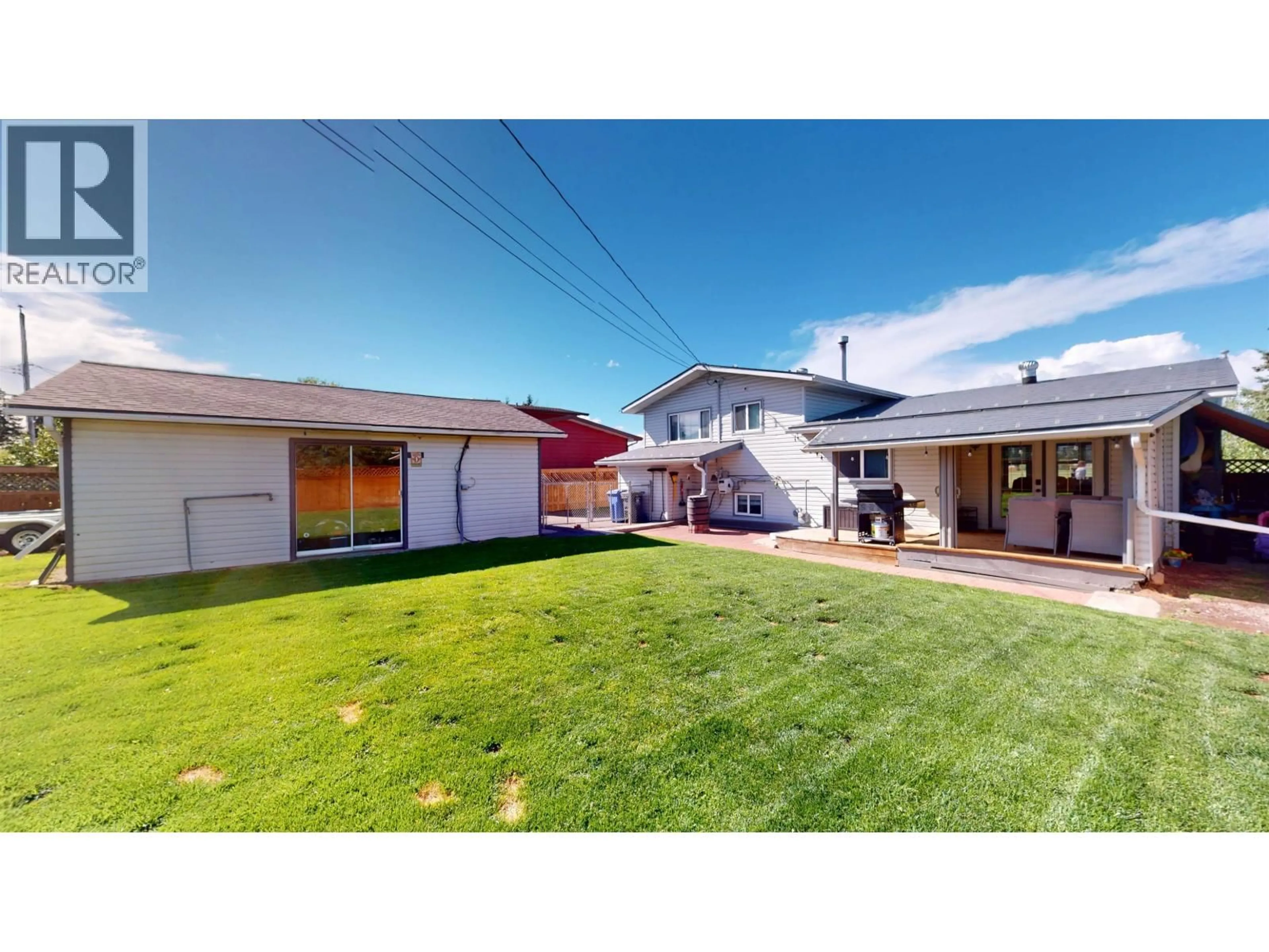 A pic from outside/outdoor area/front of a property/back of a property/a pic from drone, street for 9419 106 AVENUE, Fort St. John British Columbia V1J5L4