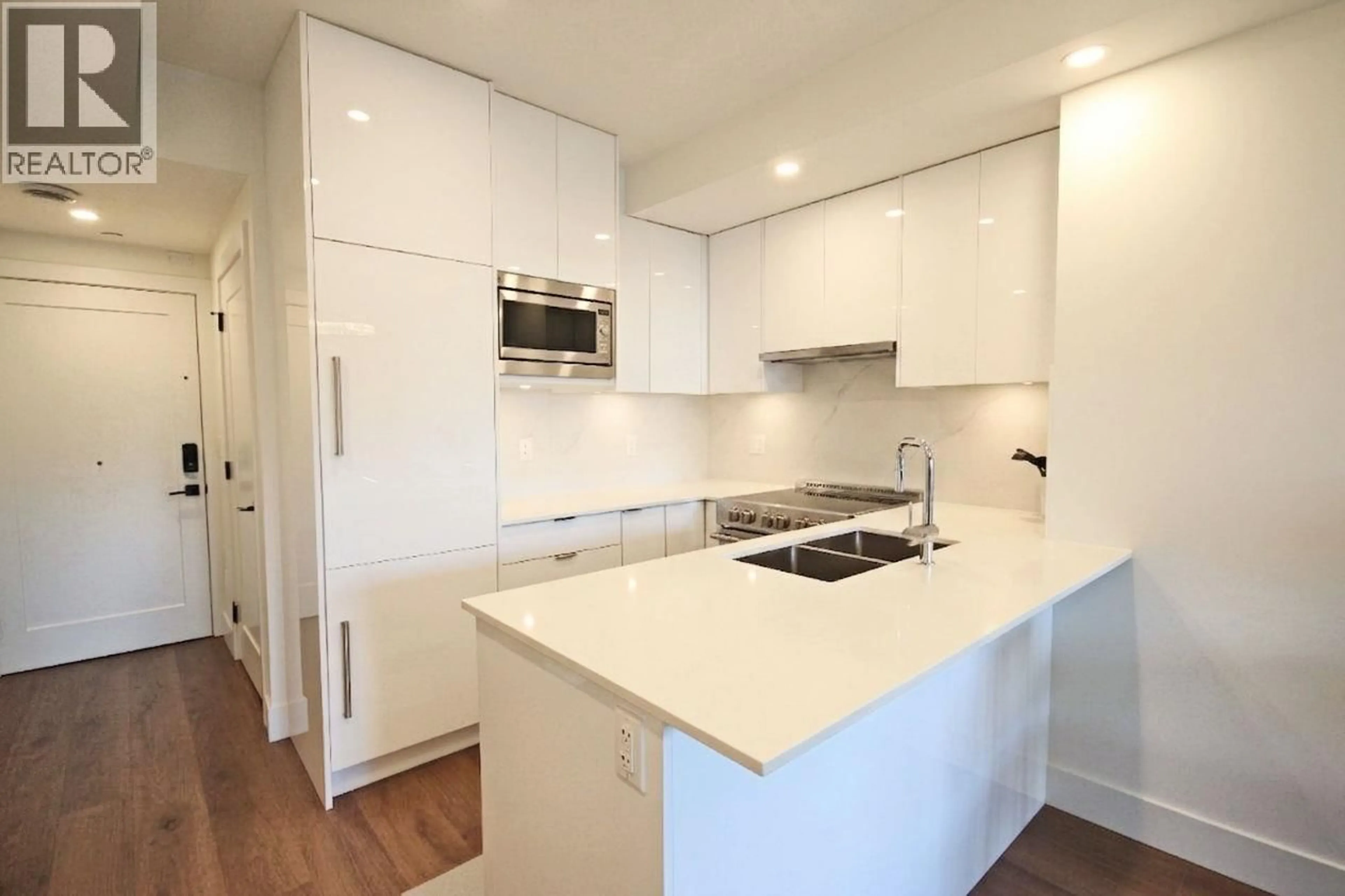Open concept kitchen, unknown for 105 - 5399 JOYCE STREET, Vancouver British Columbia V5R4H3