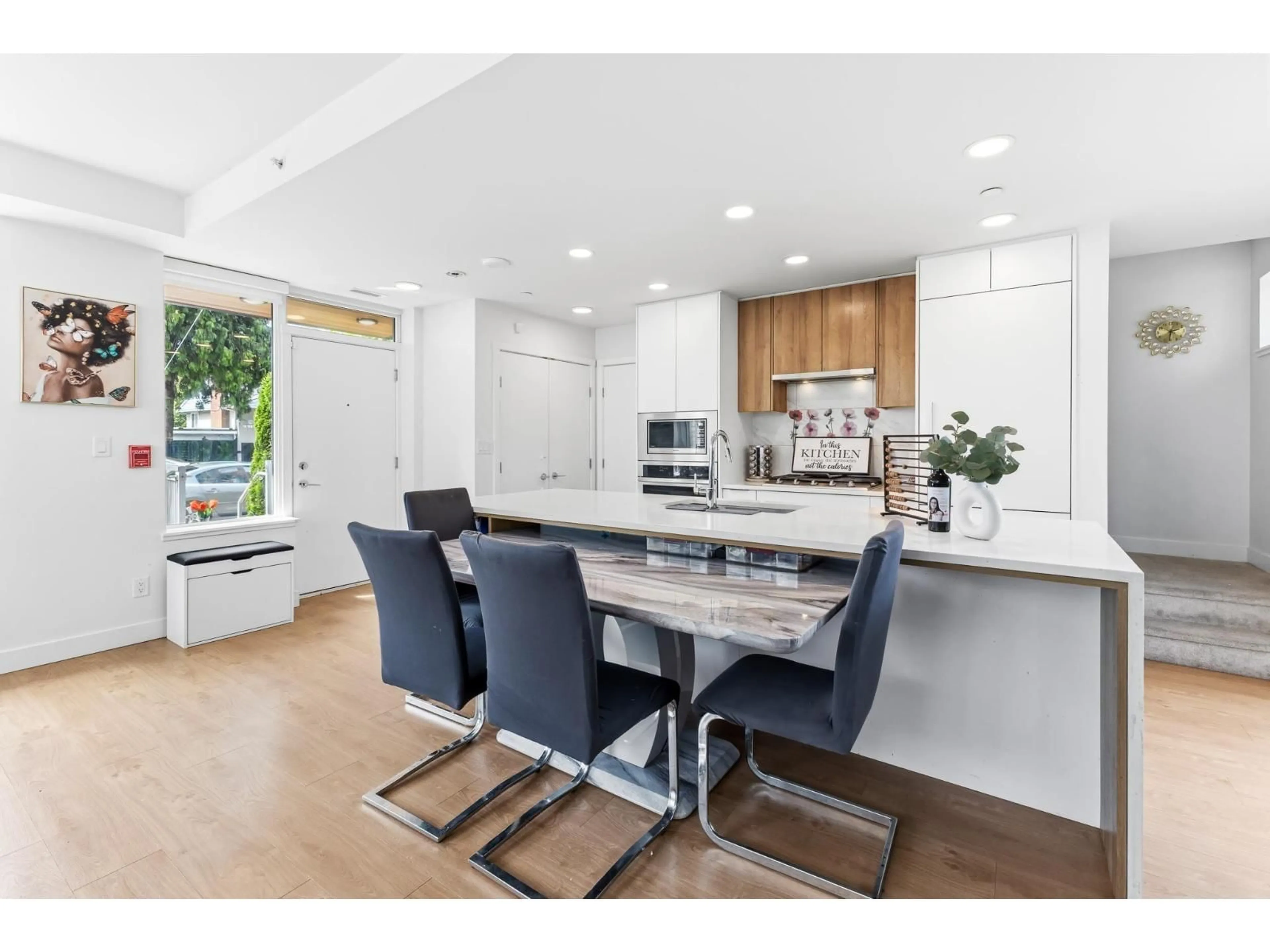 Open concept kitchen, wood/laminate floor for 3 - 10160 133 STREET, Surrey British Columbia V3T0S4