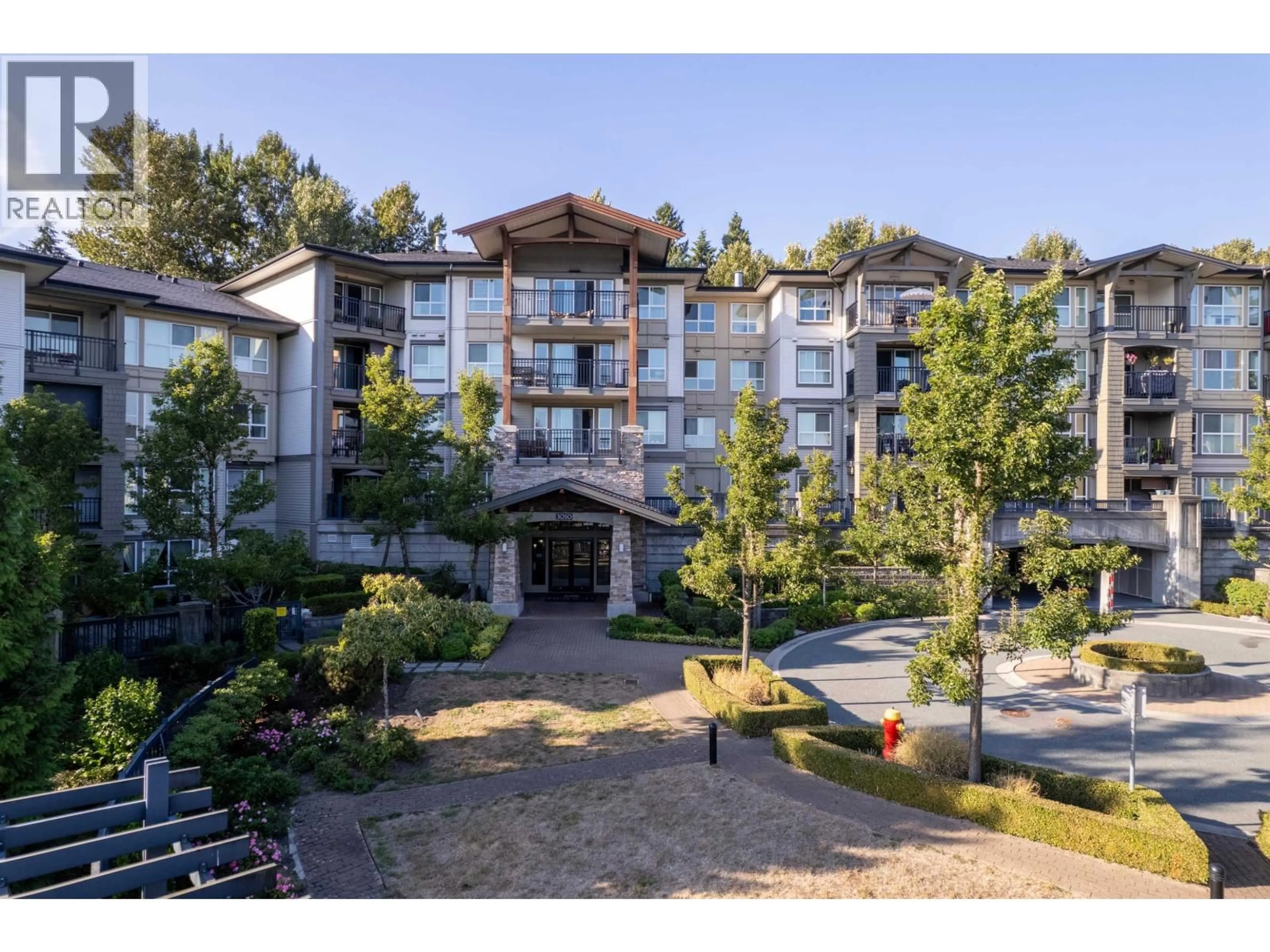 A pic from outside/outdoor area/front of a property/back of a property/a pic from drone, mountain view for 105 - 3050 DAYANEE SPRINGS BOULEVARD, Coquitlam British Columbia V3E0A2