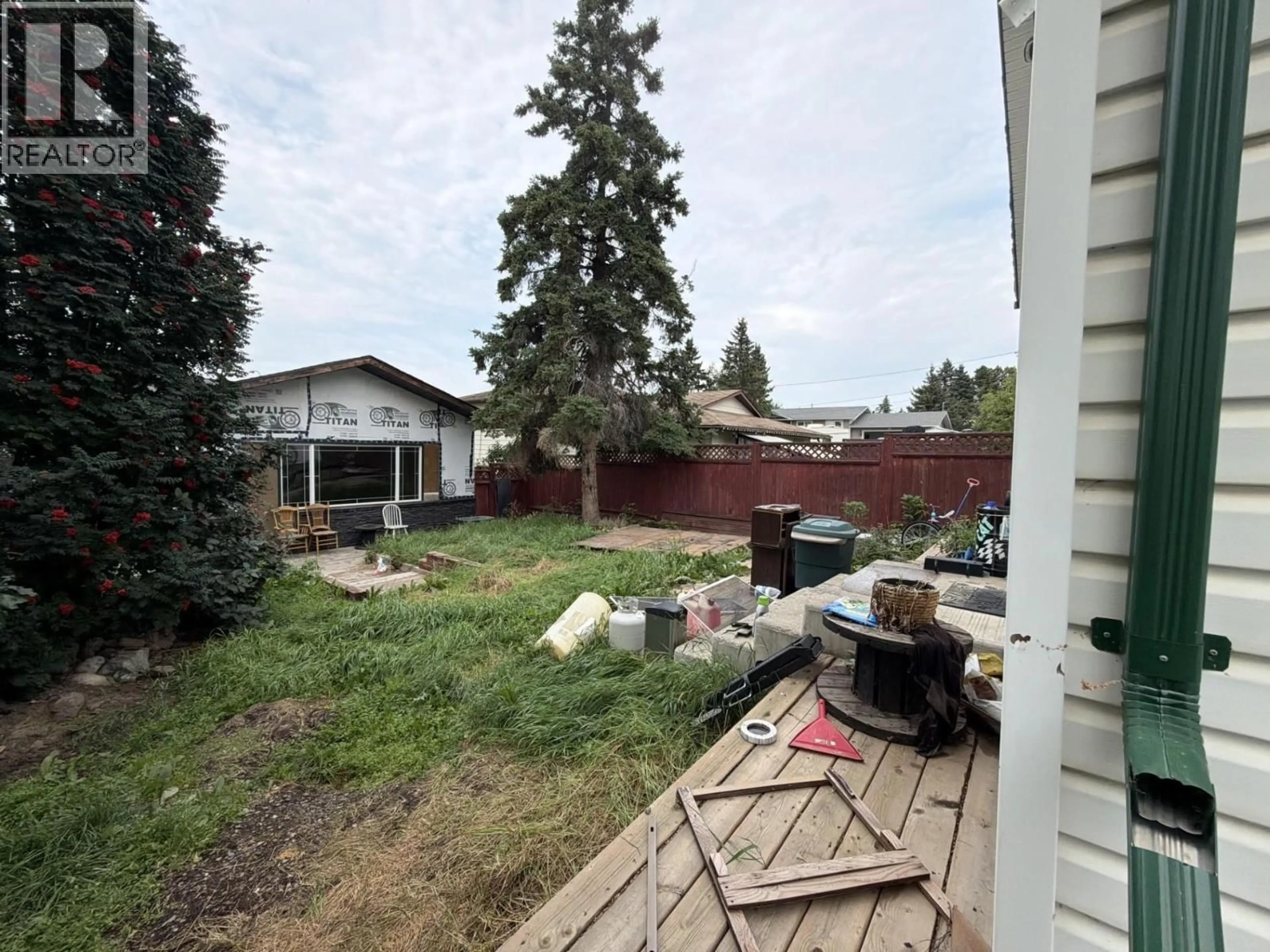 A pic from outside/outdoor area/front of a property/back of a property/a pic from drone, unknown for 9019 88 STREET, Fort St. John British Columbia V1J5B1