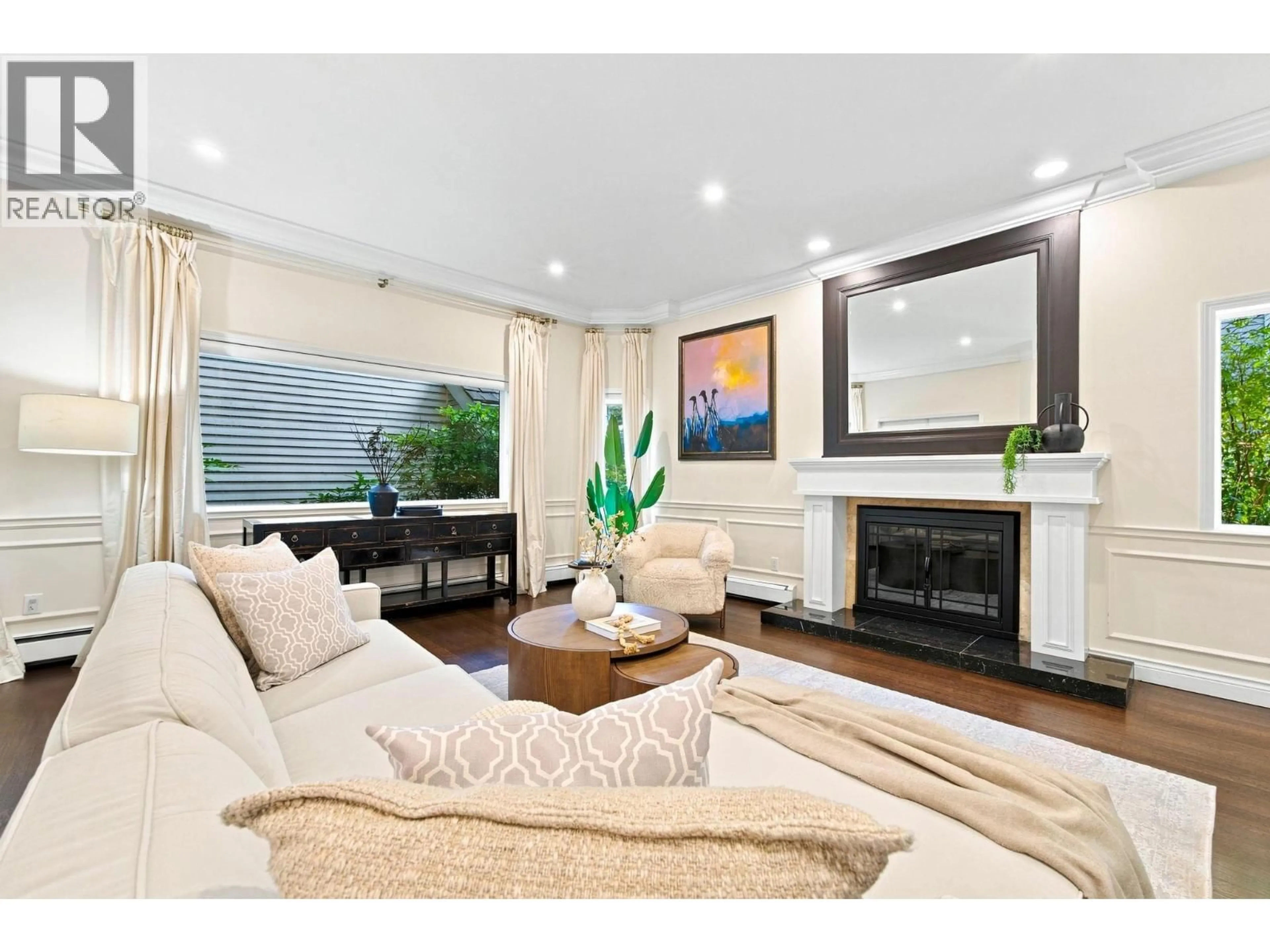 Living room with furniture, wood/laminate floor for 4245 NAUTILUS CLOSE, Vancouver British Columbia V6R4L1