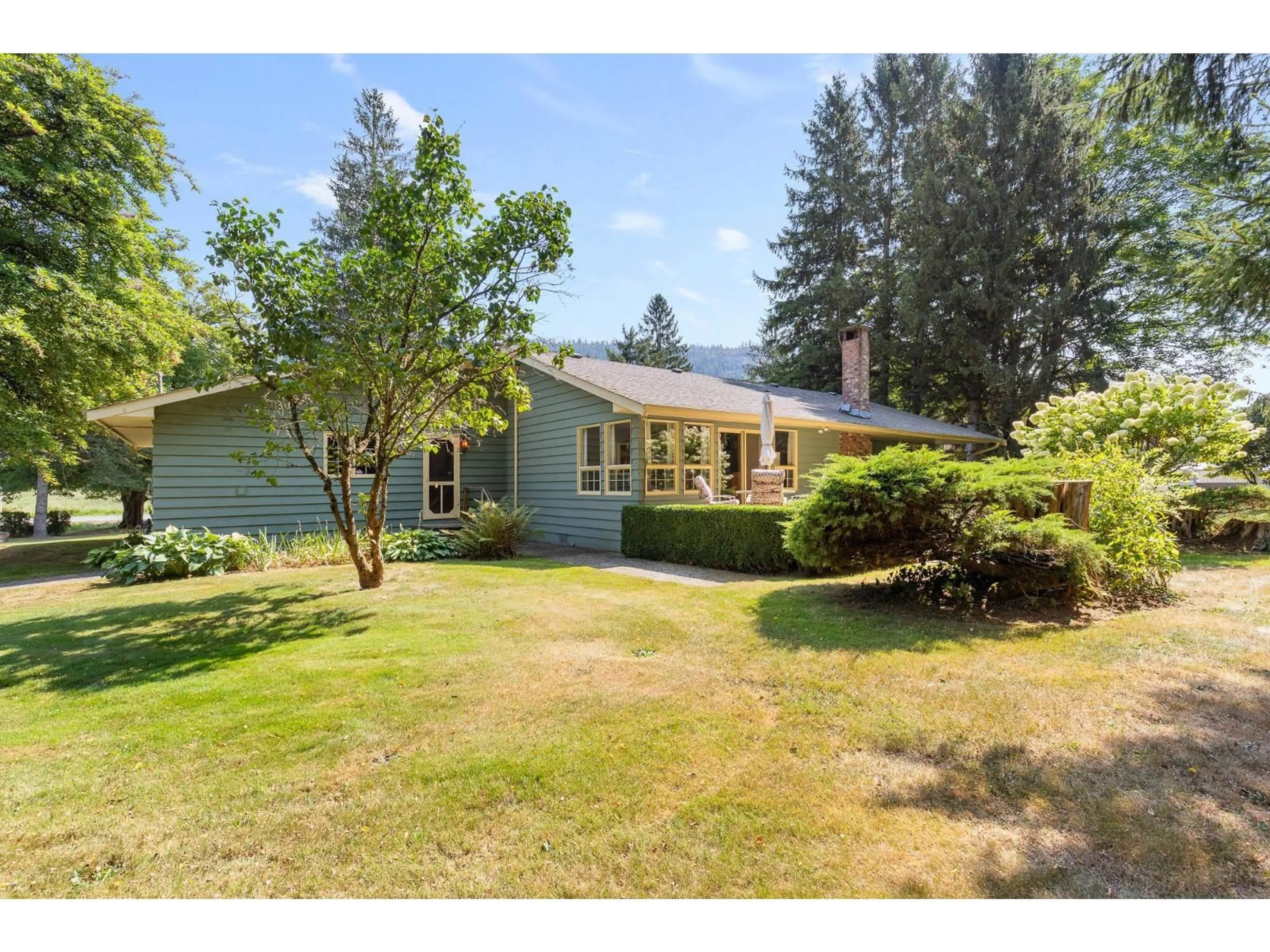 A pic from outside/outdoor area/front of a property/back of a property/a pic from drone, street for 3853 HOT SPRINGS ROAD, Agassiz British Columbia V0M1A3
