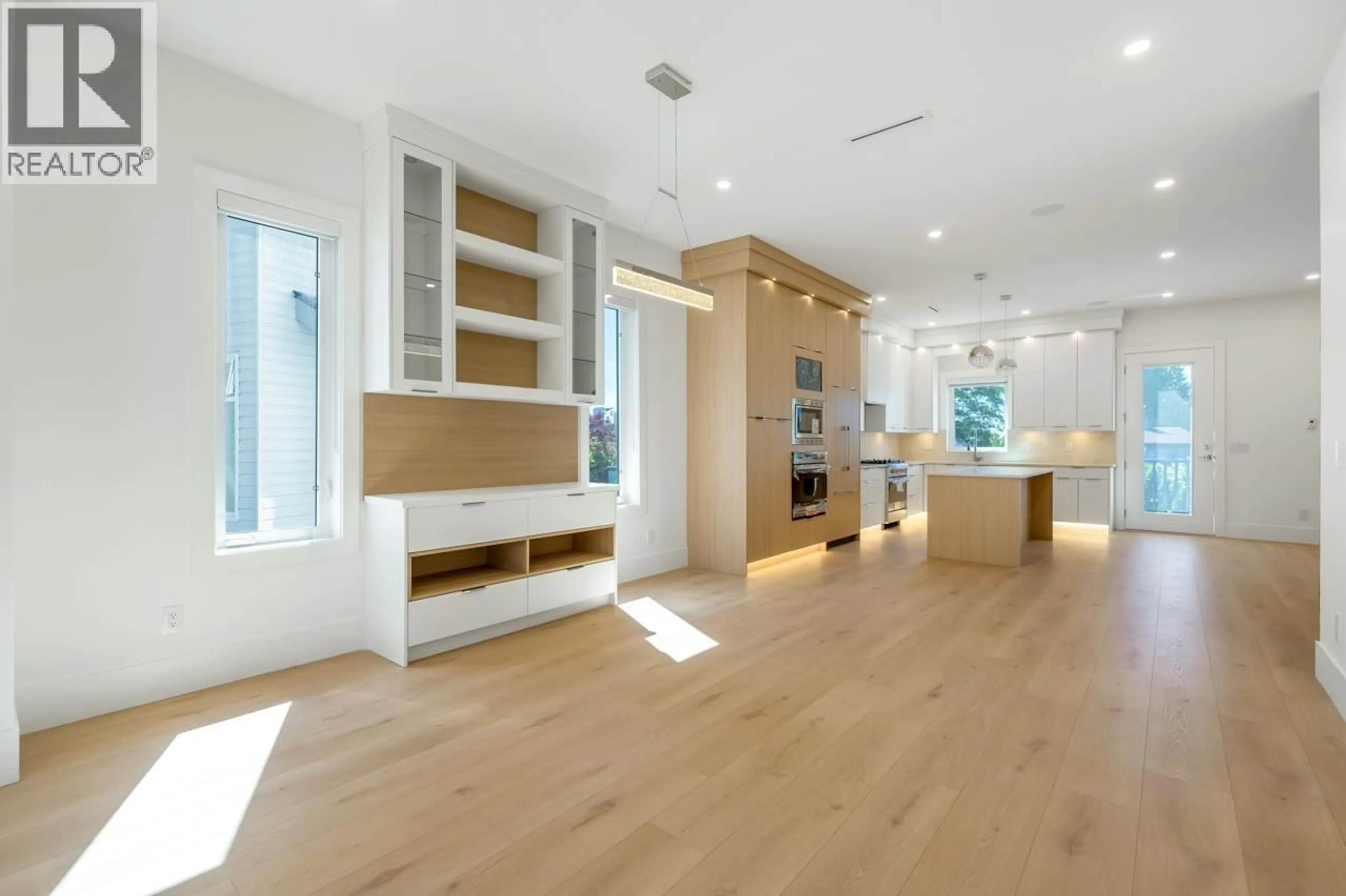 Open concept kitchen, wood/laminate floor for 1 - 6139 ASHWORTH AVENUE, Burnaby British Columbia V5E3T8