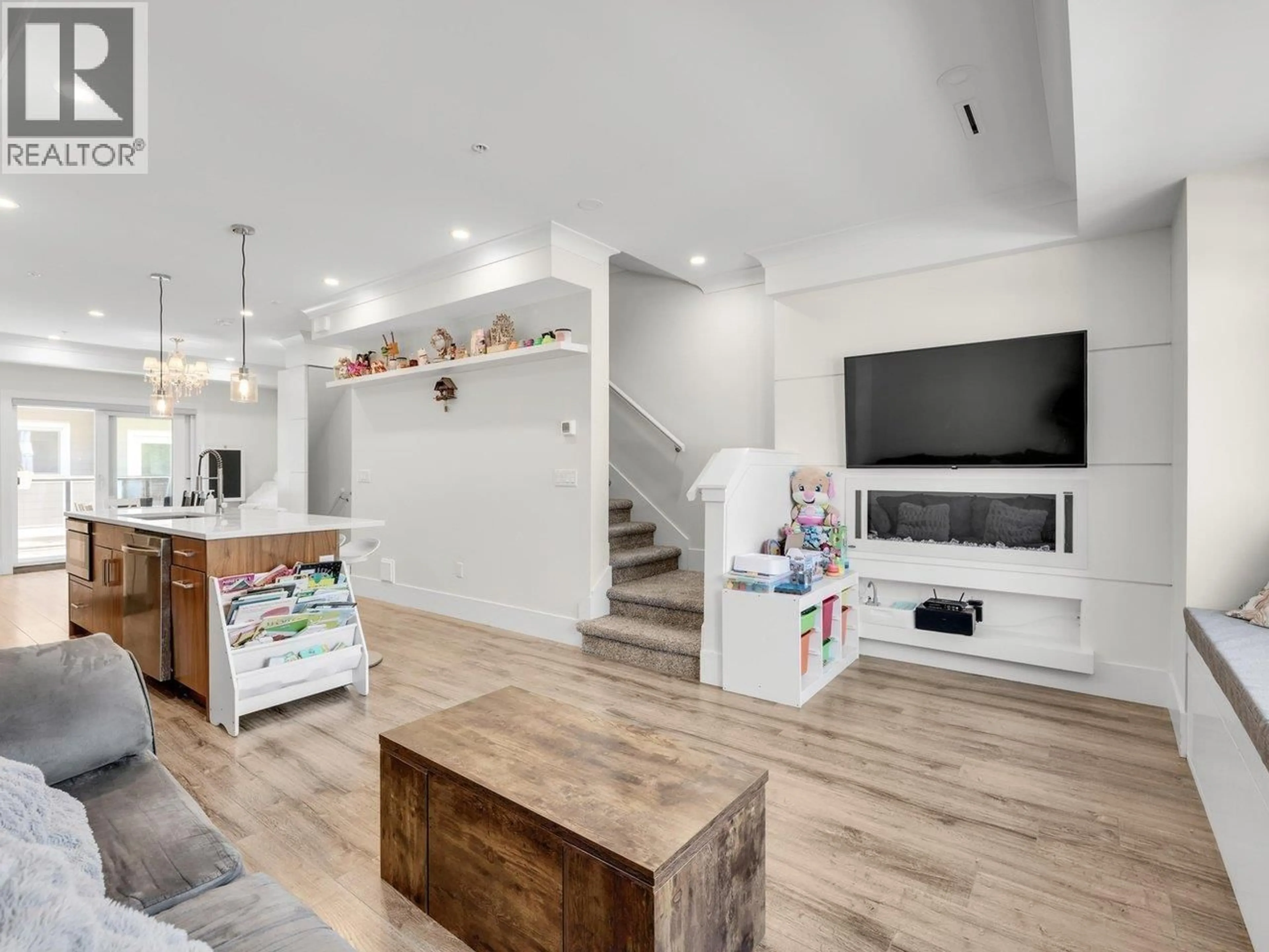 Open concept kitchen, wood/laminate floor for 4916 ELLIS LANE, Delta British Columbia V4K0E1