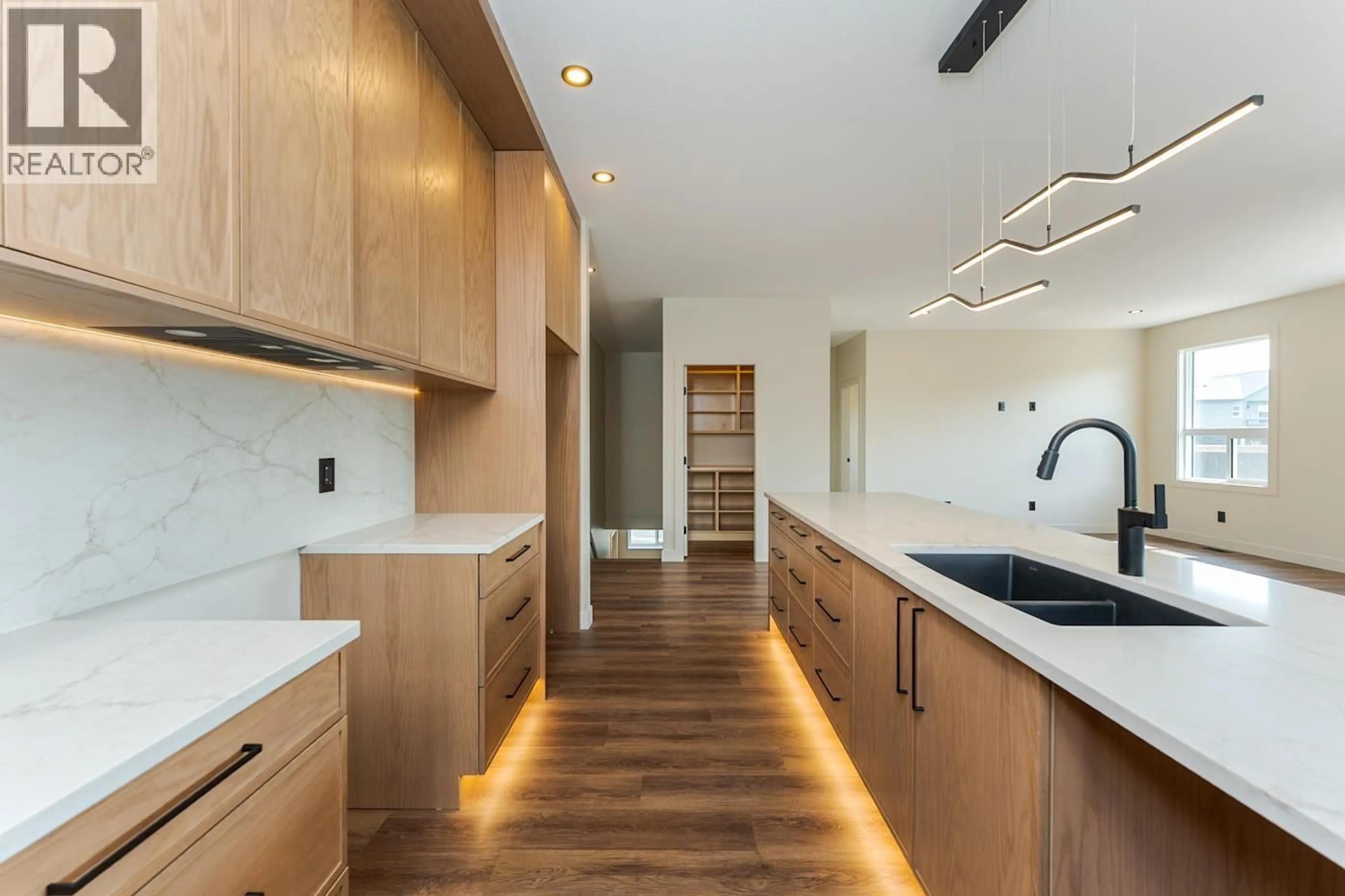 Contemporary kitchen, wood/laminate floor for 5291 BREANNA AVENUE, Prince George British Columbia V2K0B6