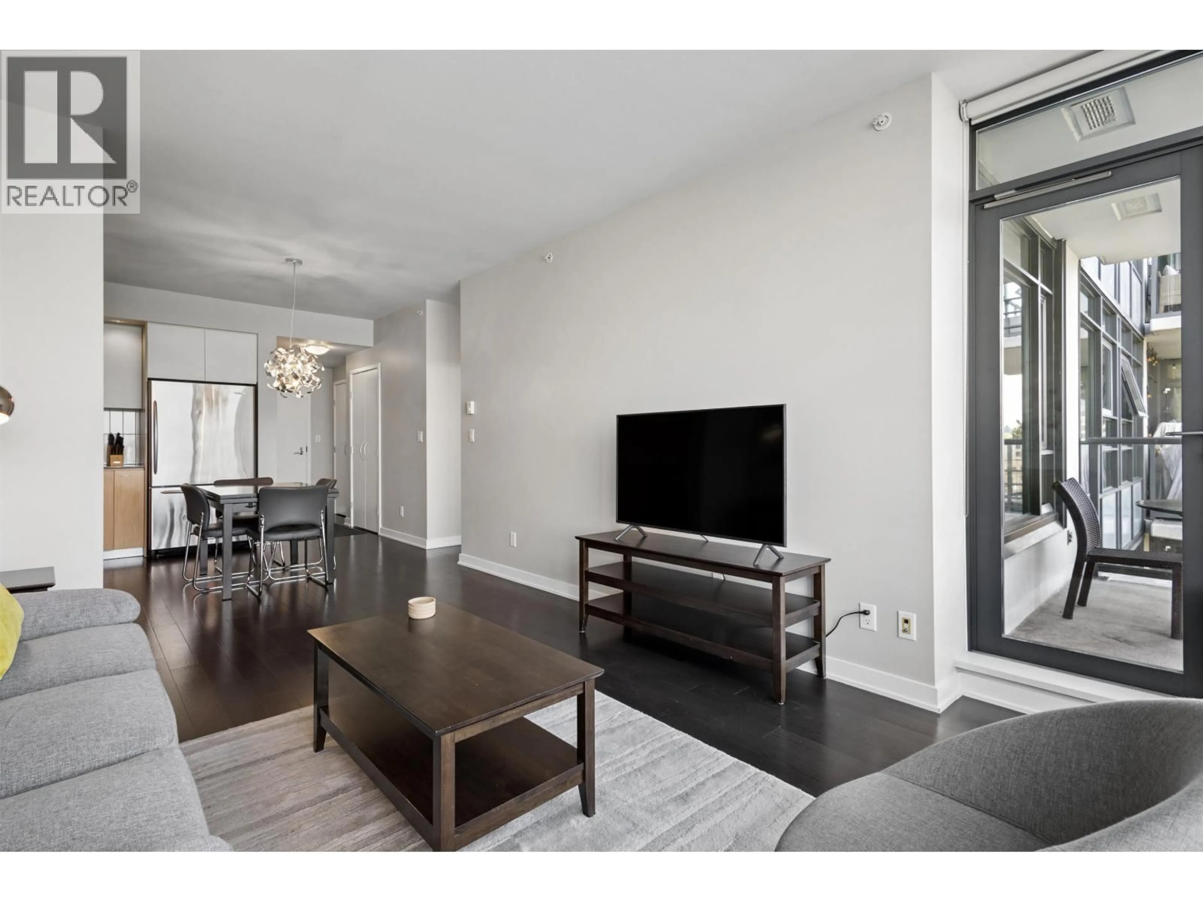 Living room with furniture, wood/laminate floor for 701 - 2851 HEATHER STREET, Vancouver British Columbia V5Z0A2