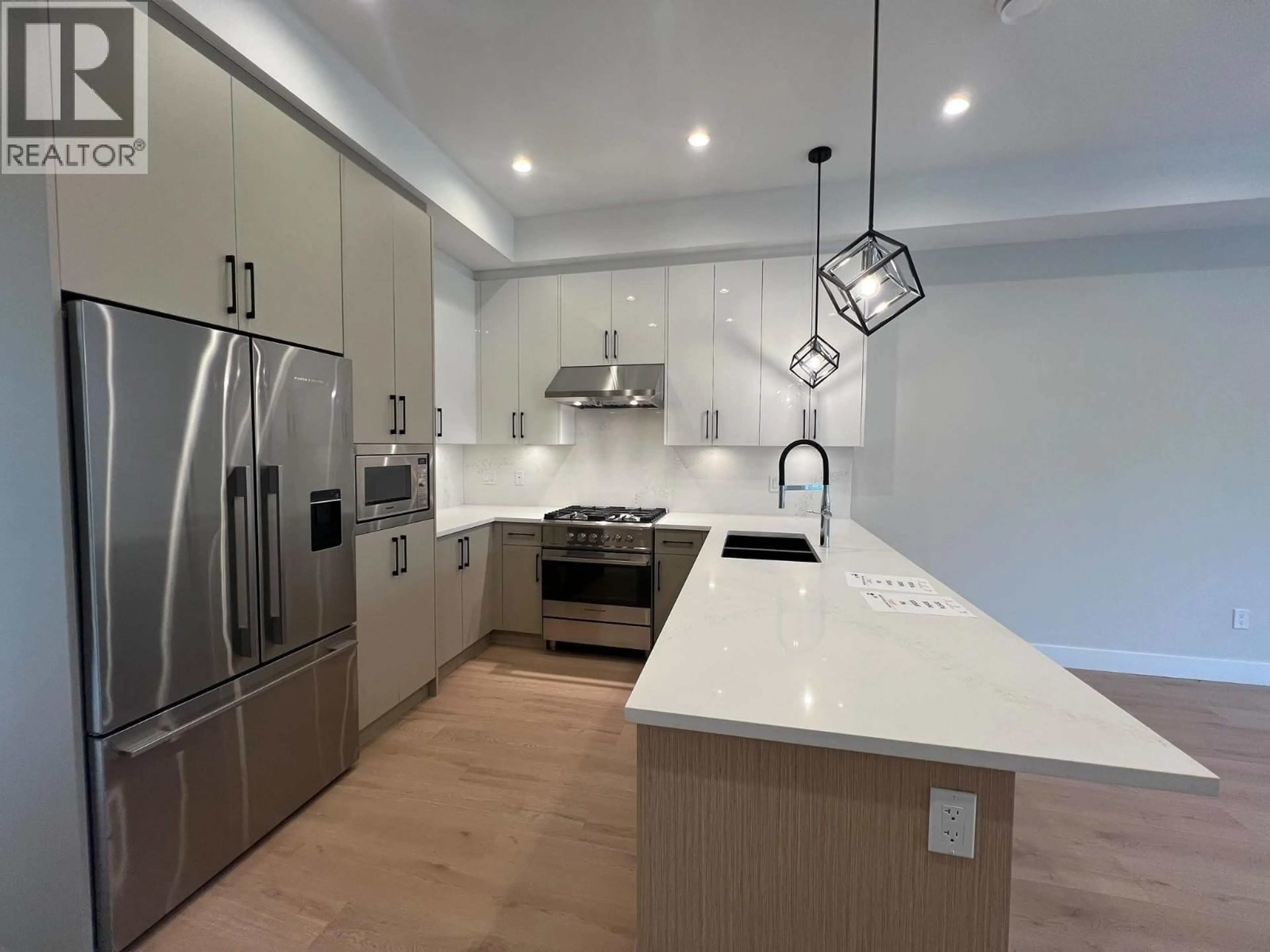 Open concept kitchen, ceramic/tile floor for 2 - 3033 SHELL ROAD, Richmond British Columbia V6X0B8