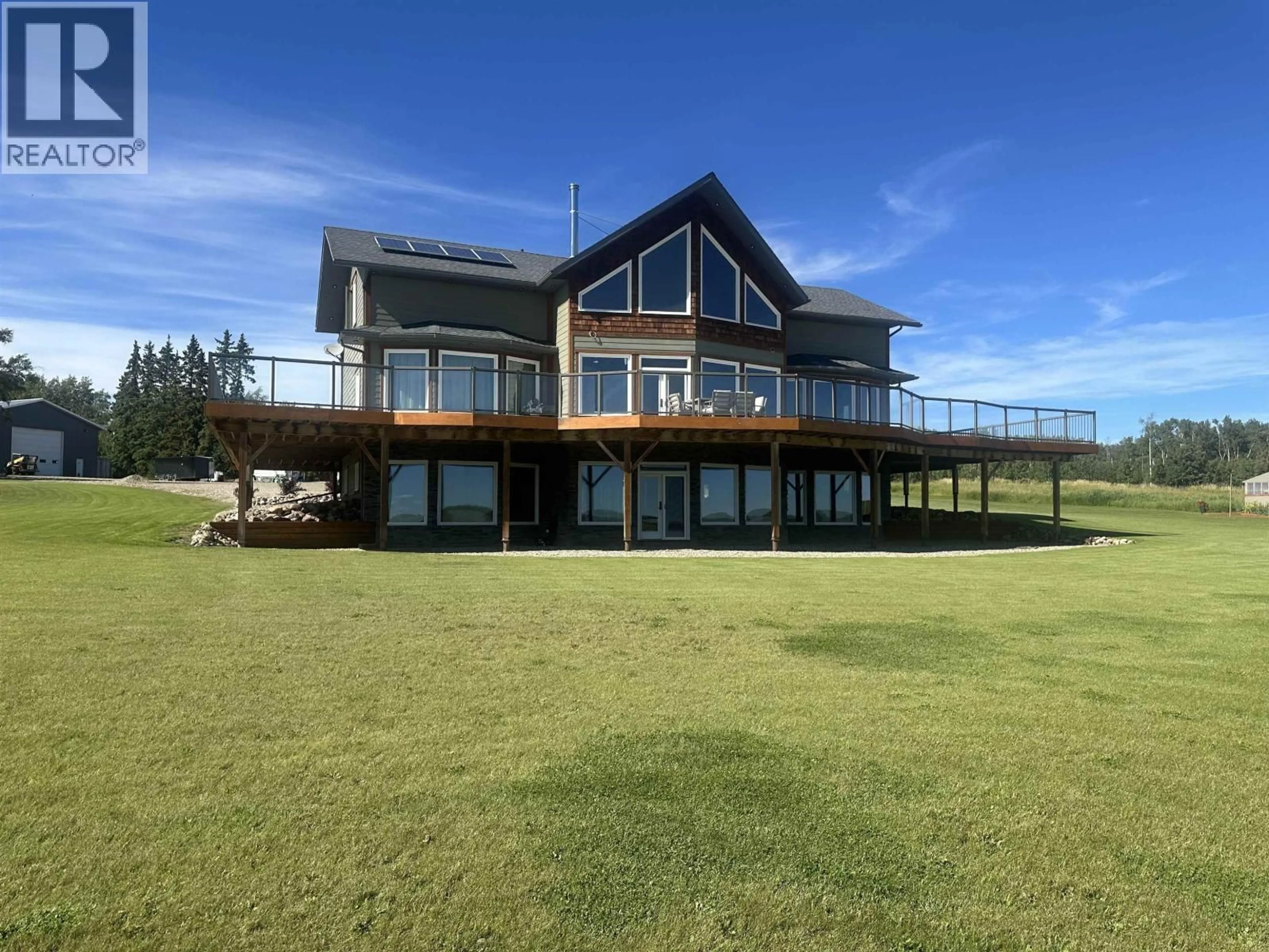 A pic from outside/outdoor area/front of a property/back of a property/a pic from drone, water/lake/river/ocean view for 16767 277 ROAD, Fort St. John British Columbia V0C1Y0