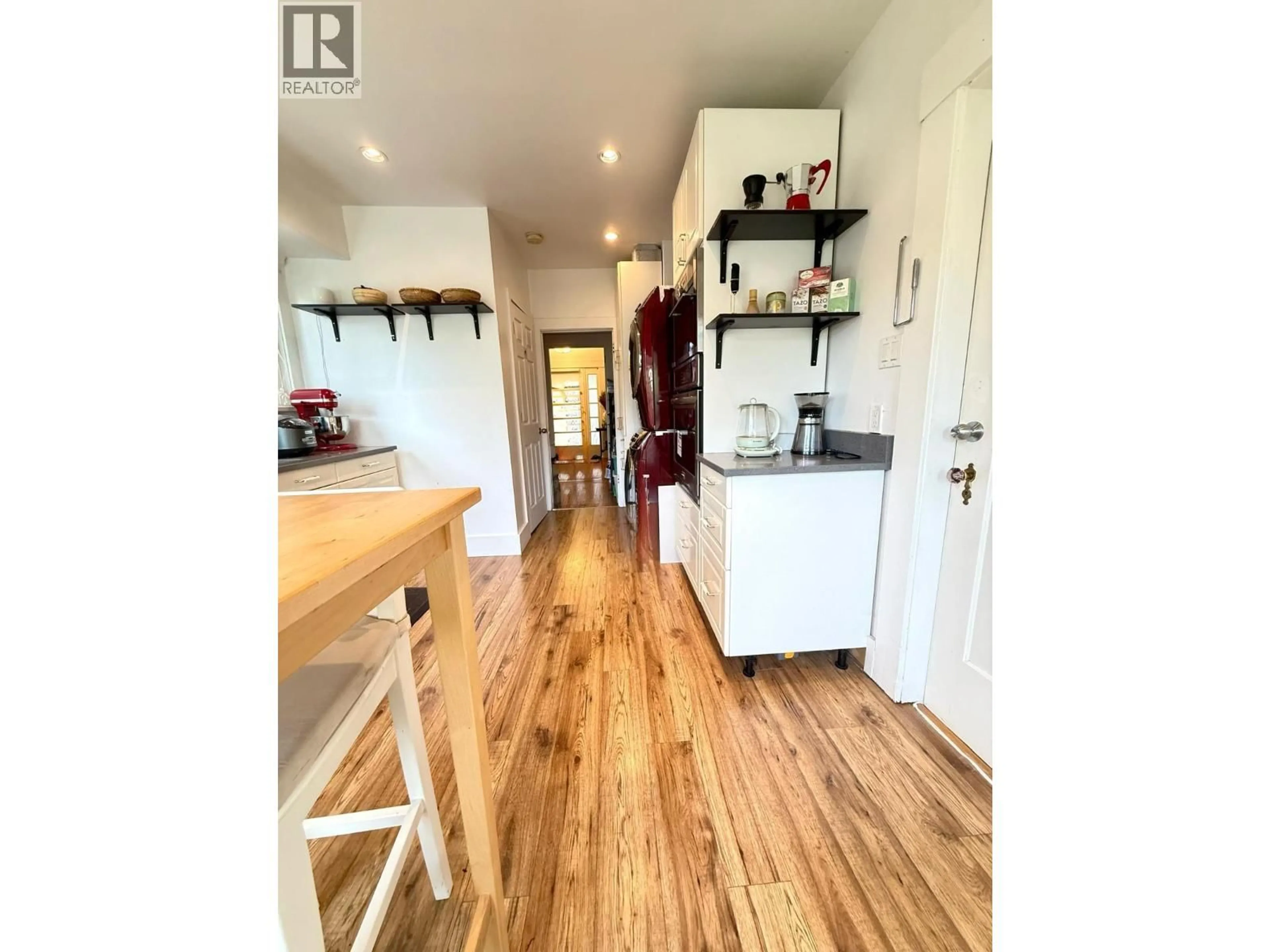 Open concept kitchen, wood/laminate floor for 2791 13TH AVENUE, Vancouver British Columbia V6K2T5