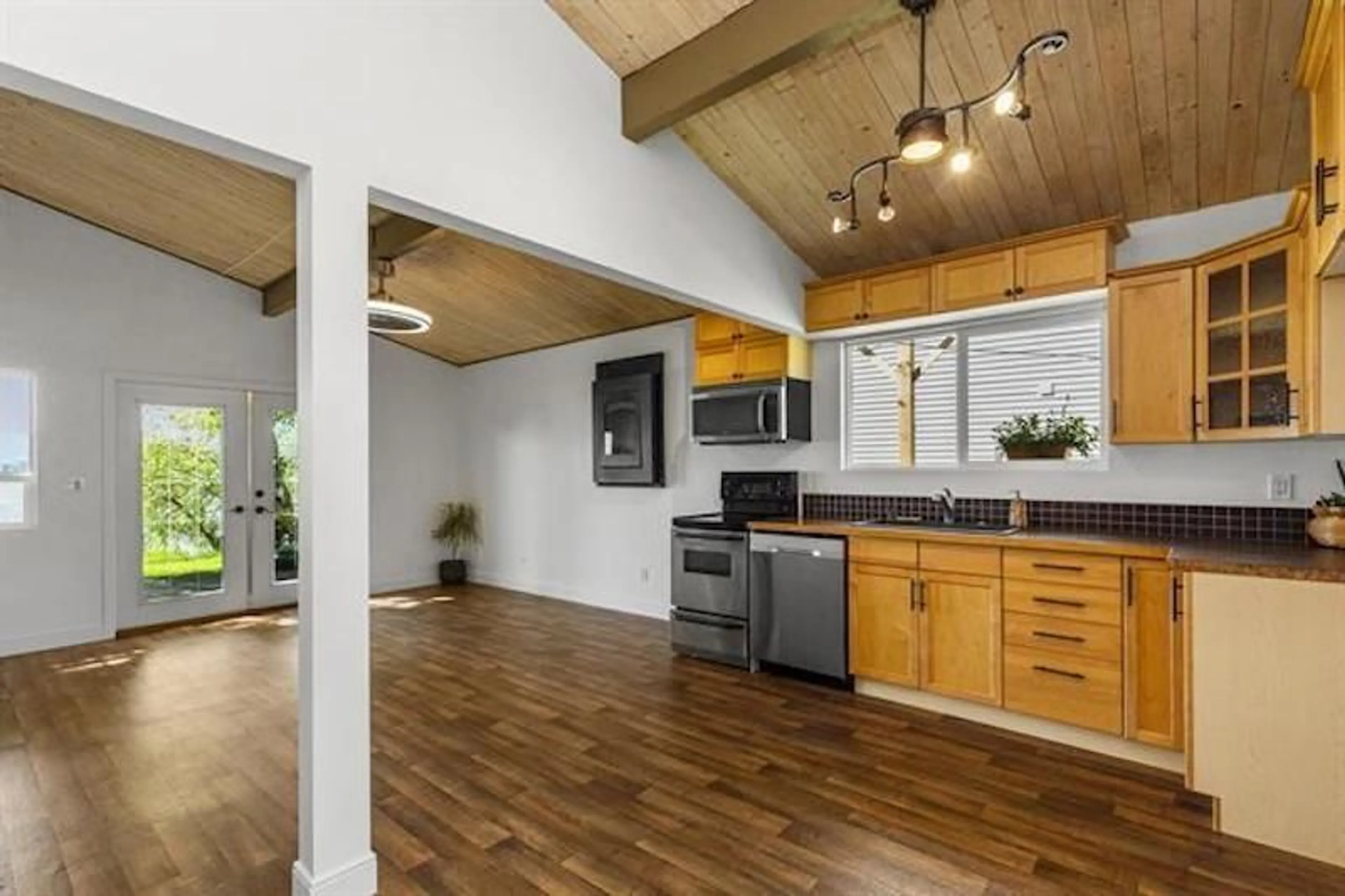 Open concept kitchen, wood/laminate floor for 35196 SWARD ROAD, Mission British Columbia V2V7H2