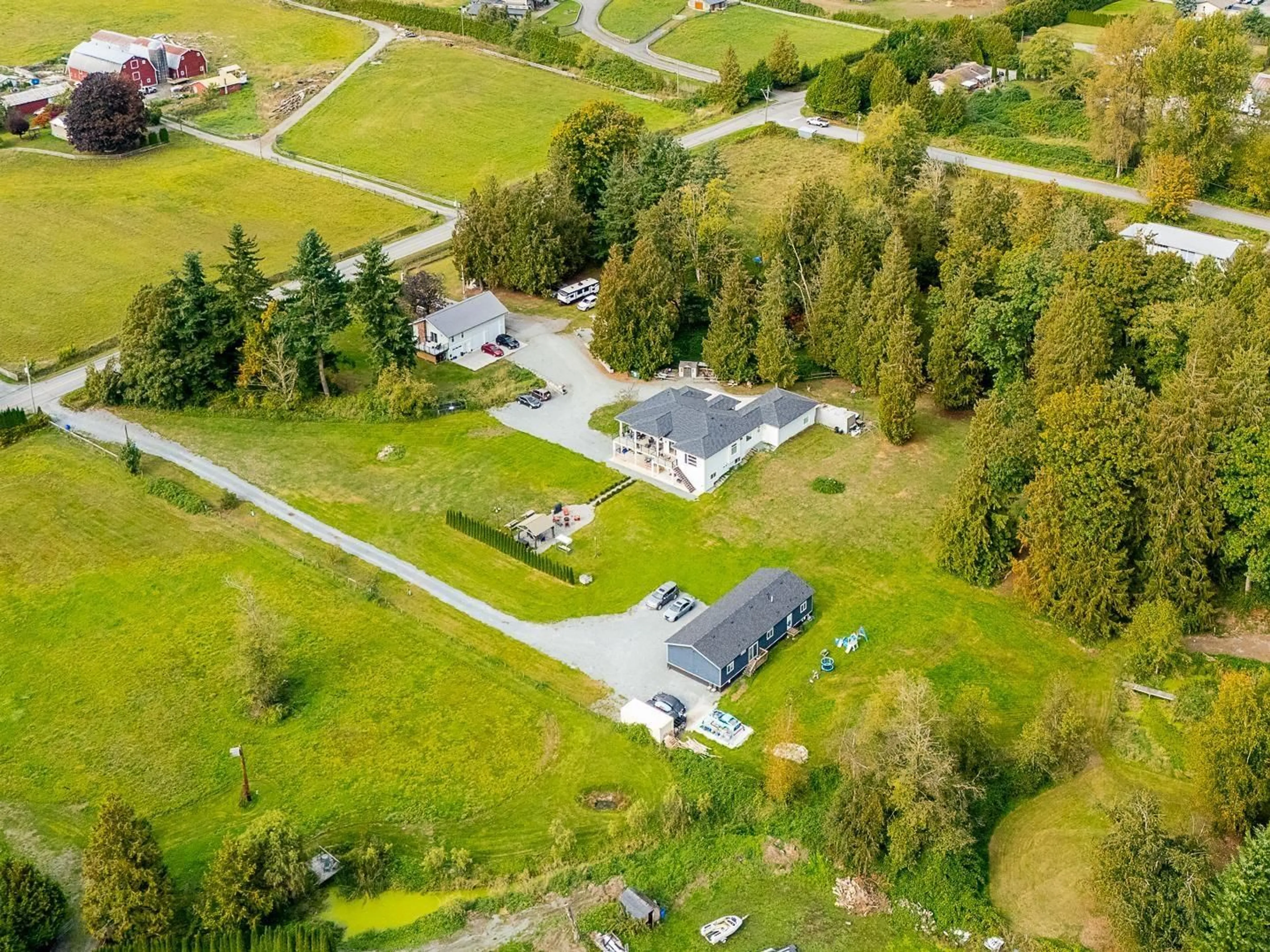 A pic from outside/outdoor area/front of a property/back of a property/a pic from drone, street for 934 248 STREET, Langley British Columbia V4W2G1