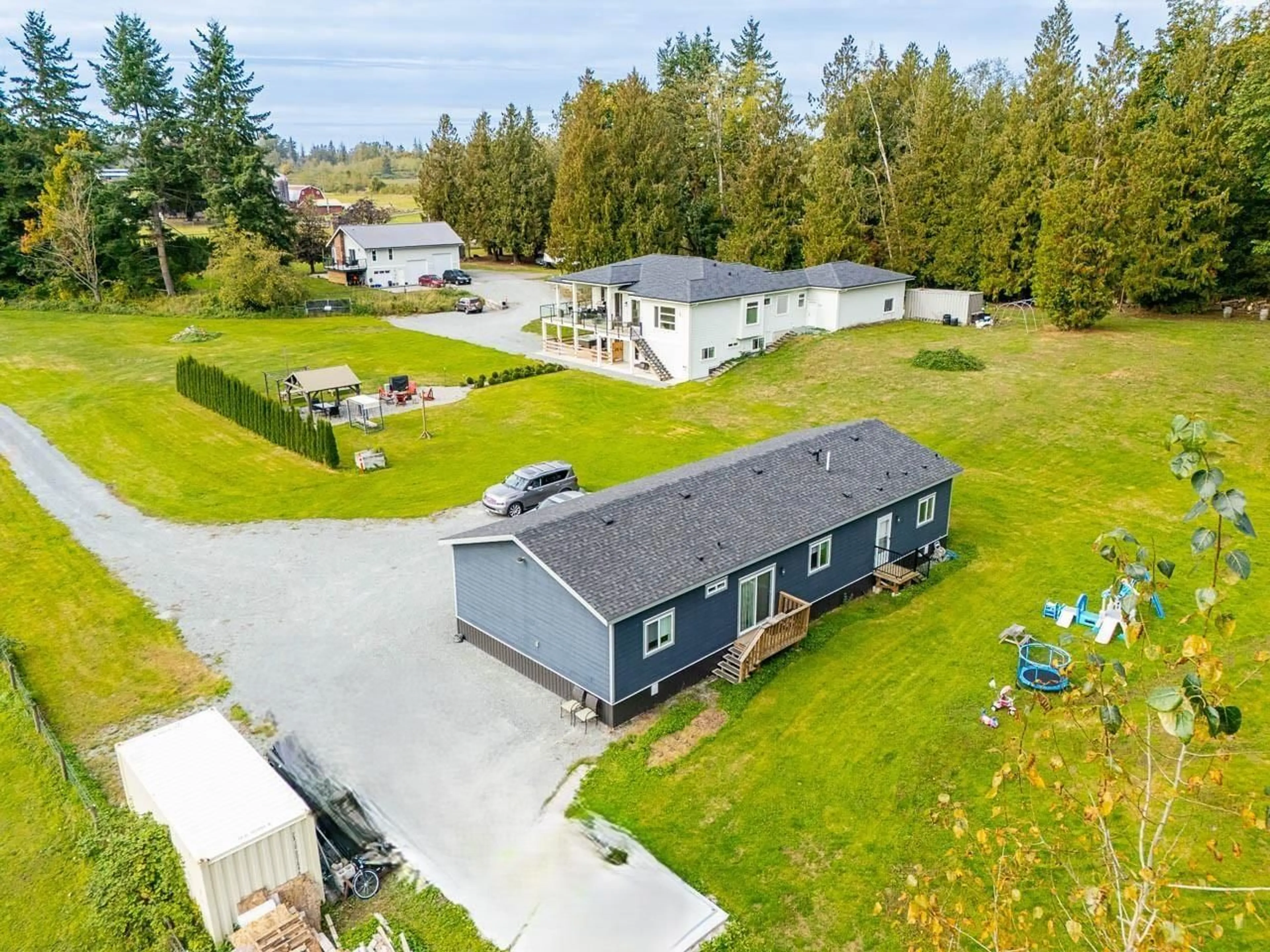 A pic from outside/outdoor area/front of a property/back of a property/a pic from drone, unknown for 934 248 STREET, Langley British Columbia V4W2G1