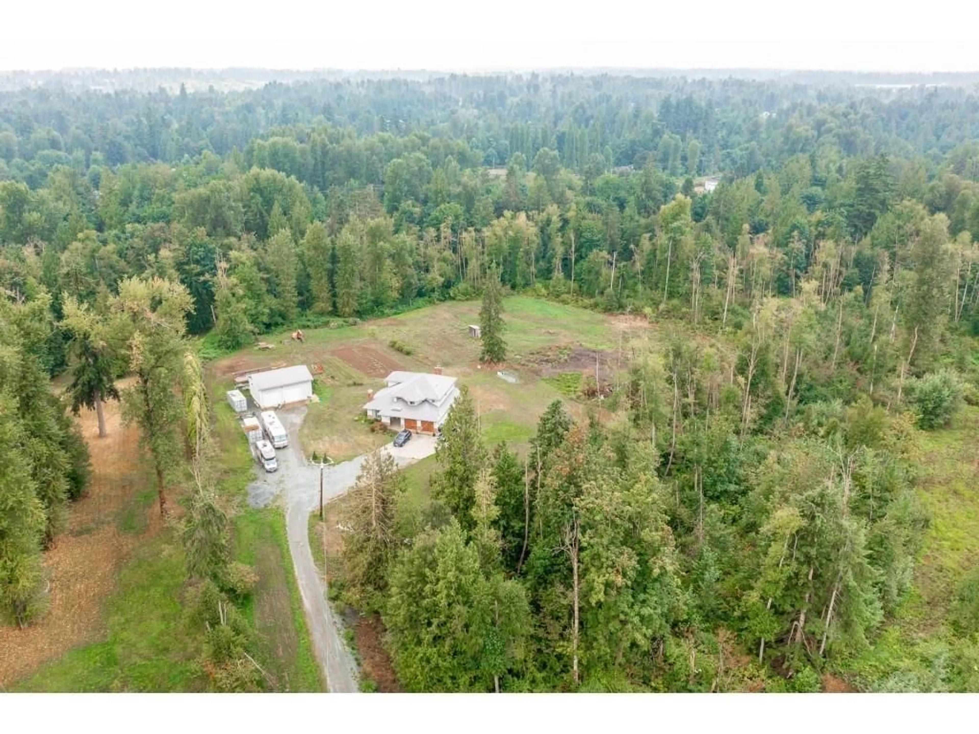 A pic from outside/outdoor area/front of a property/back of a property/a pic from drone, forest/trees view for 28344 HARRIS ROAD, Abbotsford British Columbia V4X2E9
