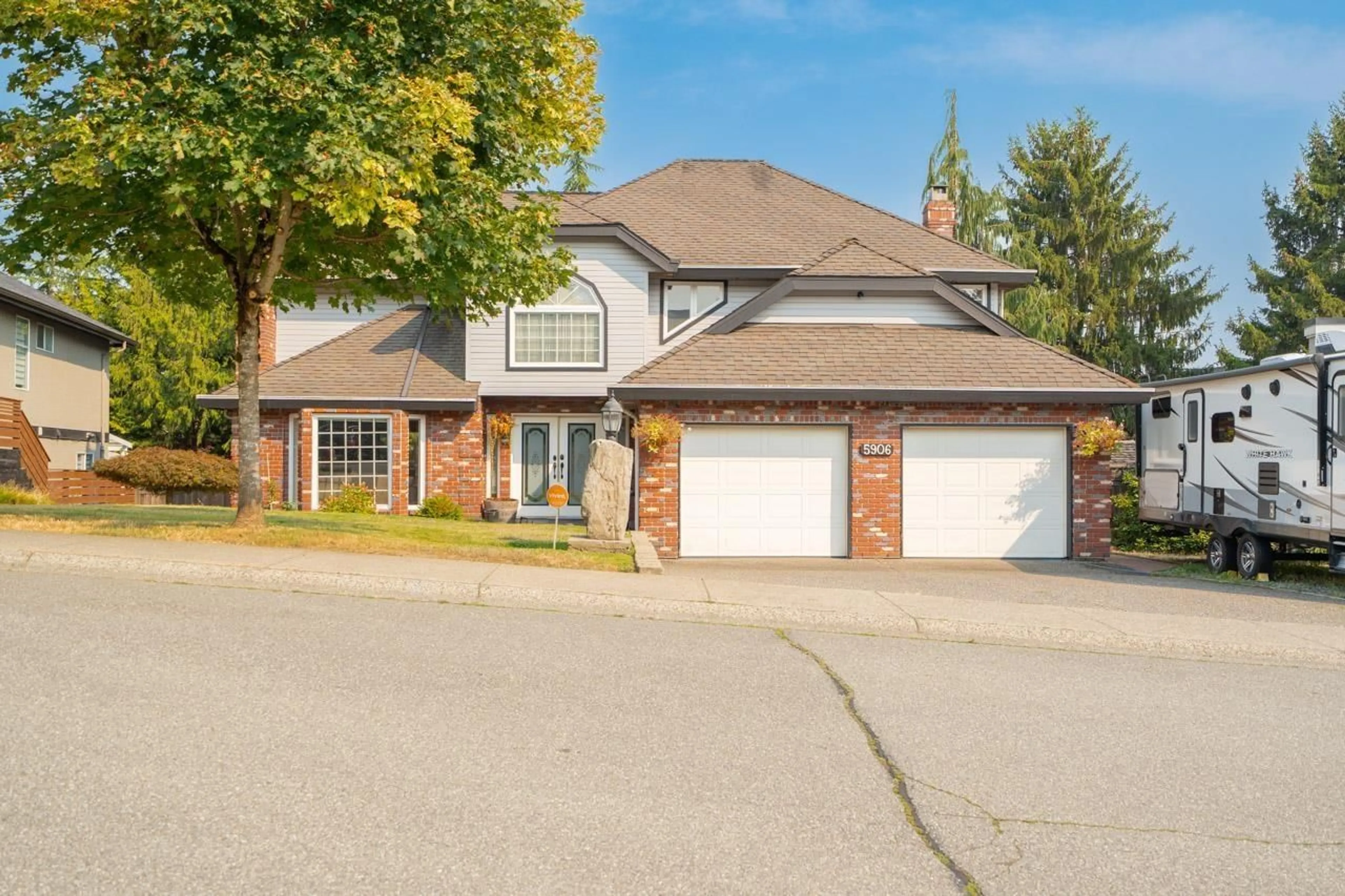 Home with brick exterior material, street for 5906 190A STREET, Surrey British Columbia V3S7W5