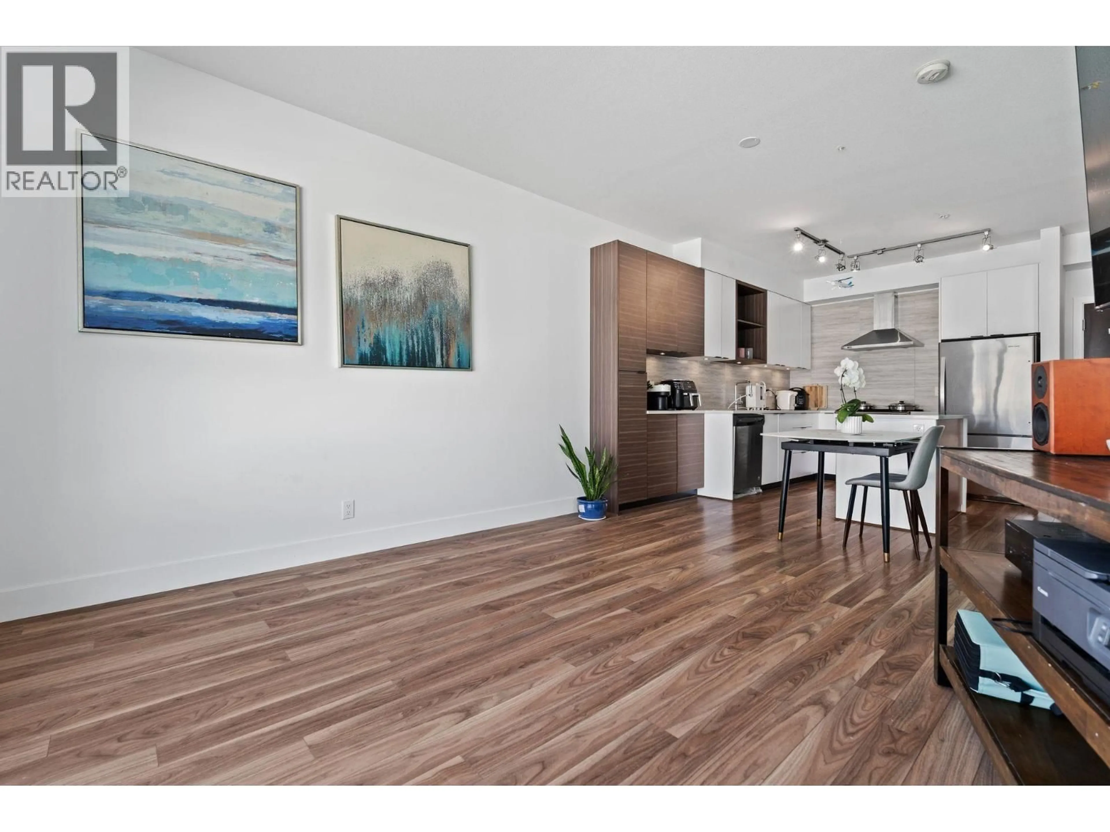 Open concept kitchen, wood/laminate floor for 216 - 5355 LANE STREET, Burnaby British Columbia V5H0H1