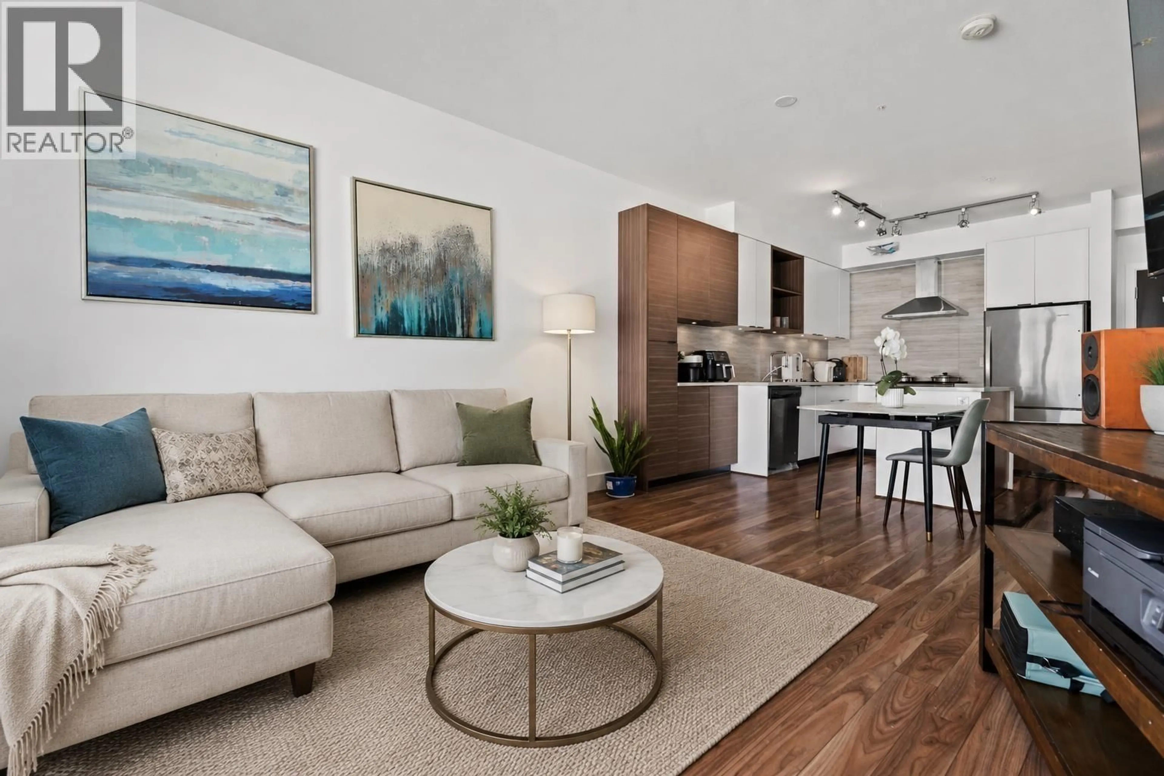 Living room with furniture, wood/laminate floor for 216 - 5355 LANE STREET, Burnaby British Columbia V5H0H1