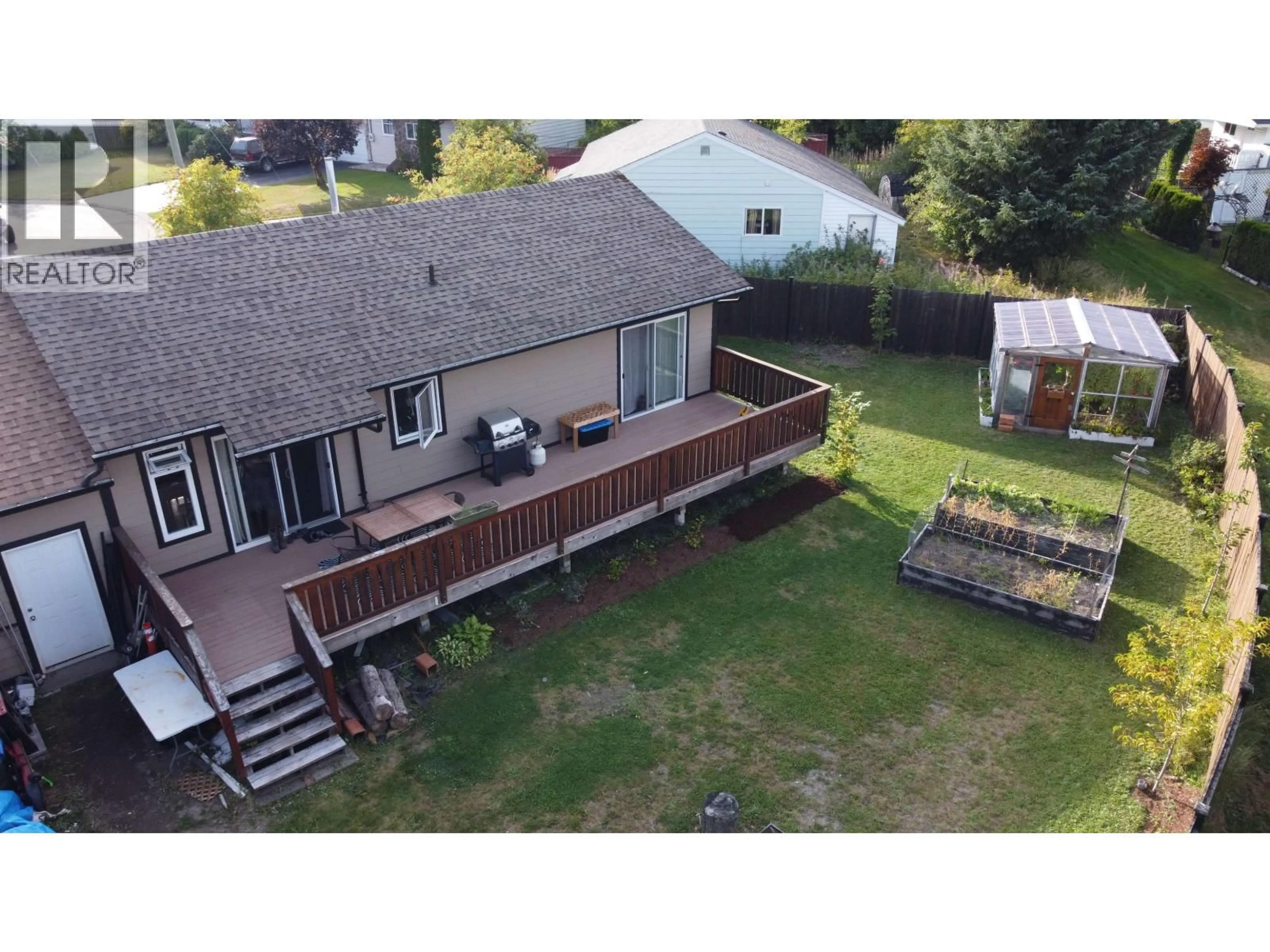 A pic from outside/outdoor area/front of a property/back of a property/a pic from drone, mountain view for 26 NASS STREET, Kitimat British Columbia V8C2A2