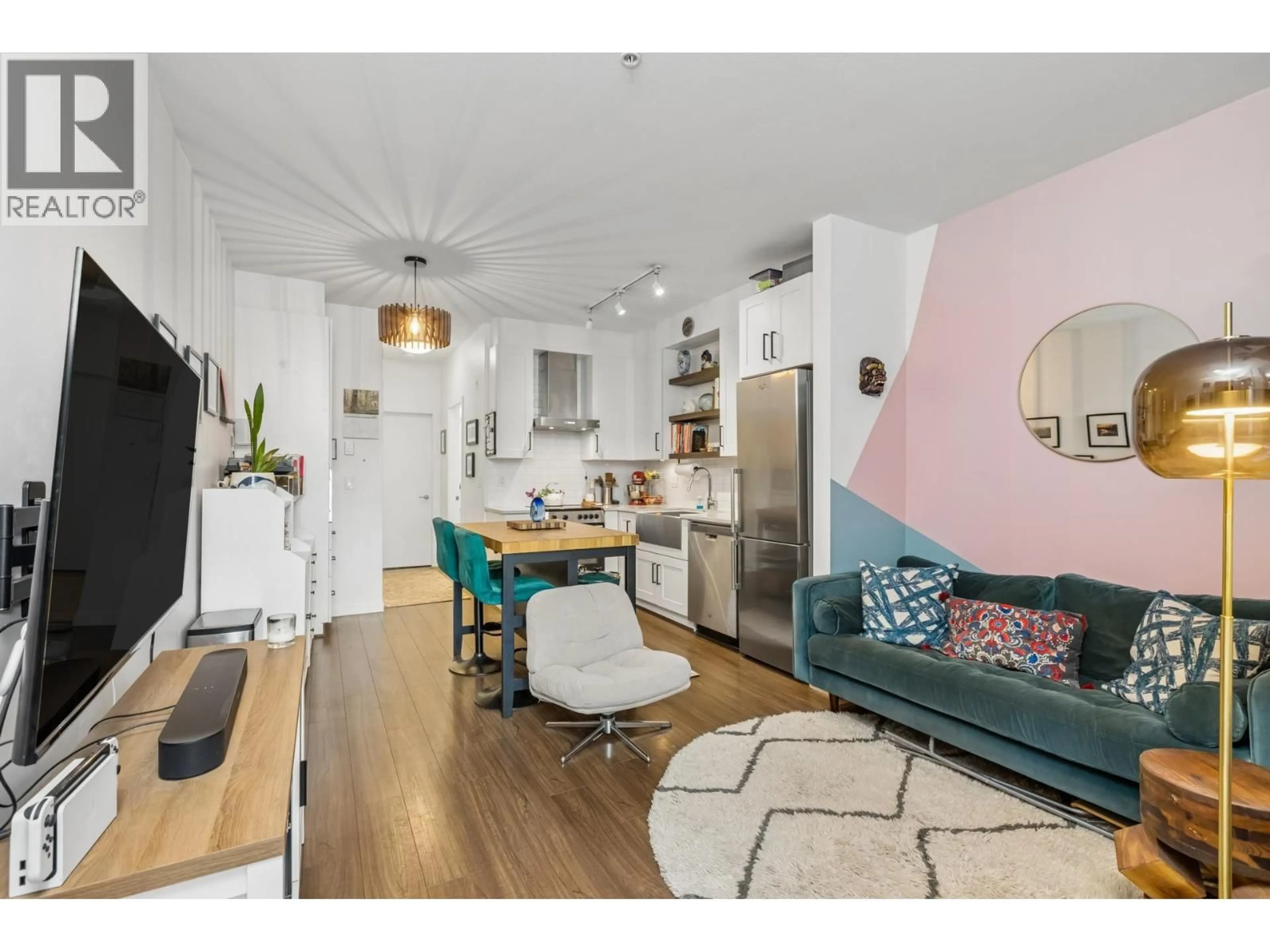 Open concept kitchen, wood/laminate floor for 50 - 433 SEYMOUR RIVER PLACE, North Vancouver British Columbia V7H0B8