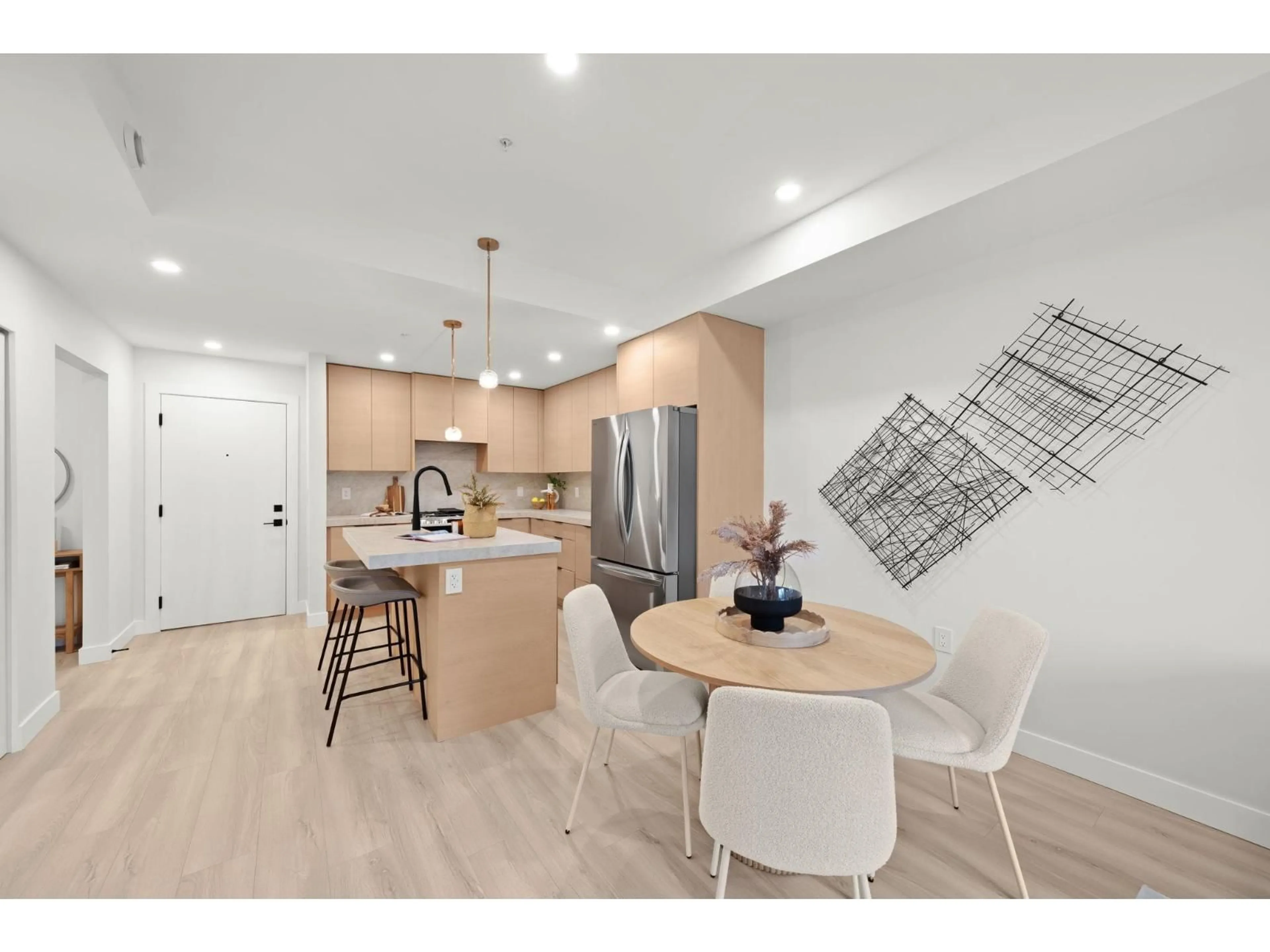 Open concept kitchen, wood/laminate floor for 208 - 15353 17 AVENUE, Surrey British Columbia V4A1T8