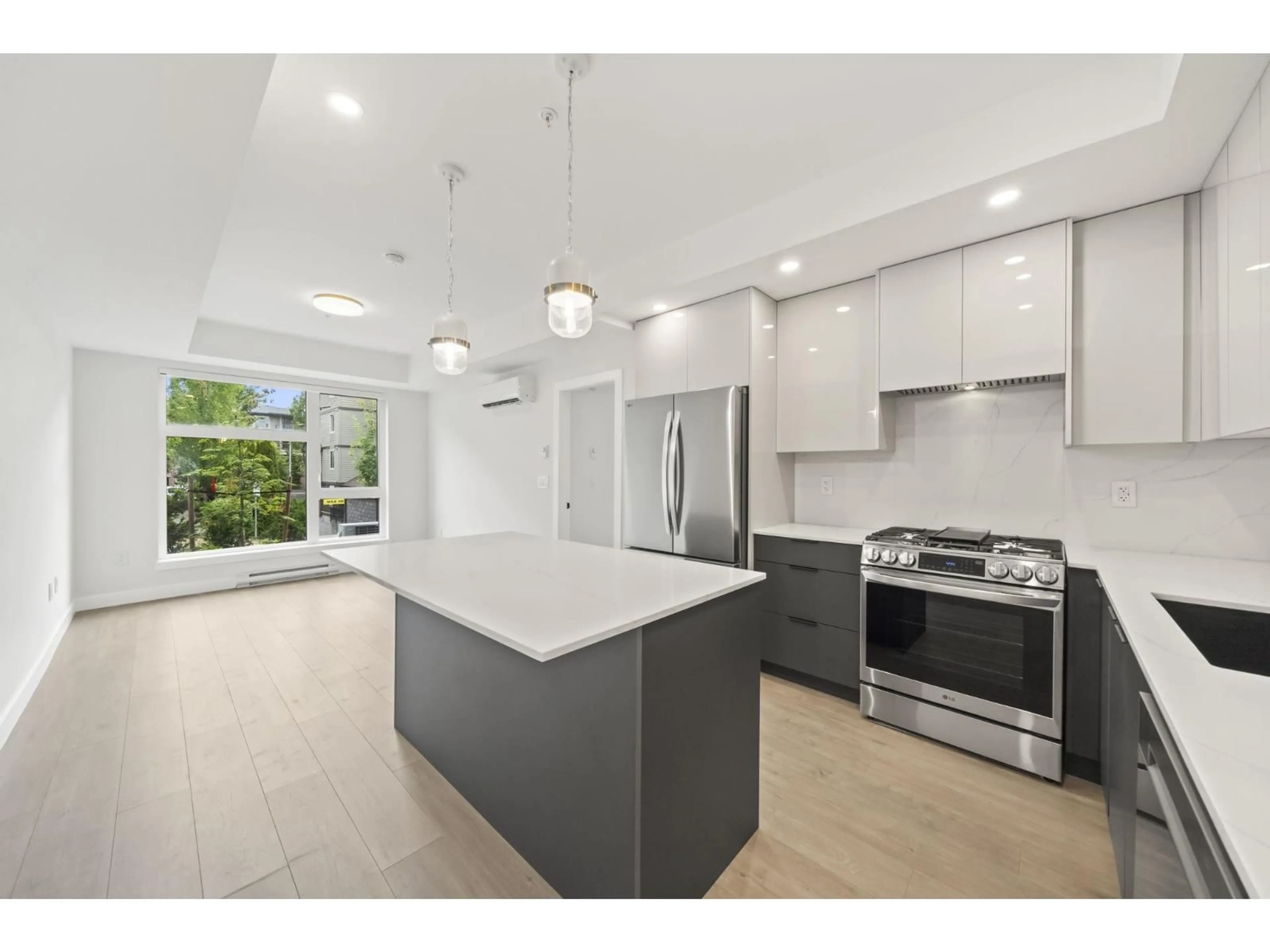 Open concept kitchen, unknown for 103 - 15353 17 AVENUE, Surrey British Columbia V4A1T8