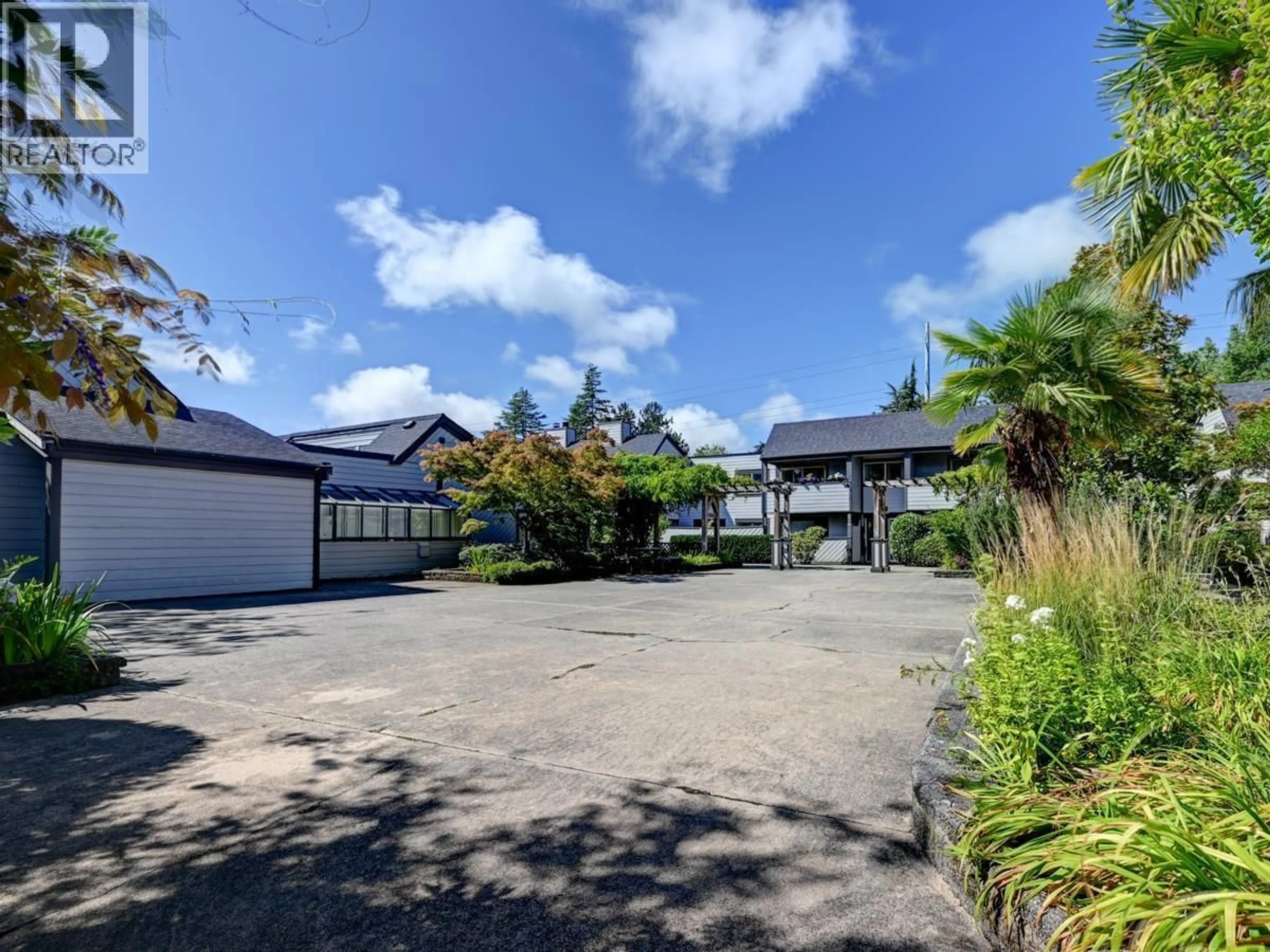 A pic from outside/outdoor area/front of a property/back of a property/a pic from drone, street for 144 - 5421 10 AVENUE, Delta British Columbia V4M3T9