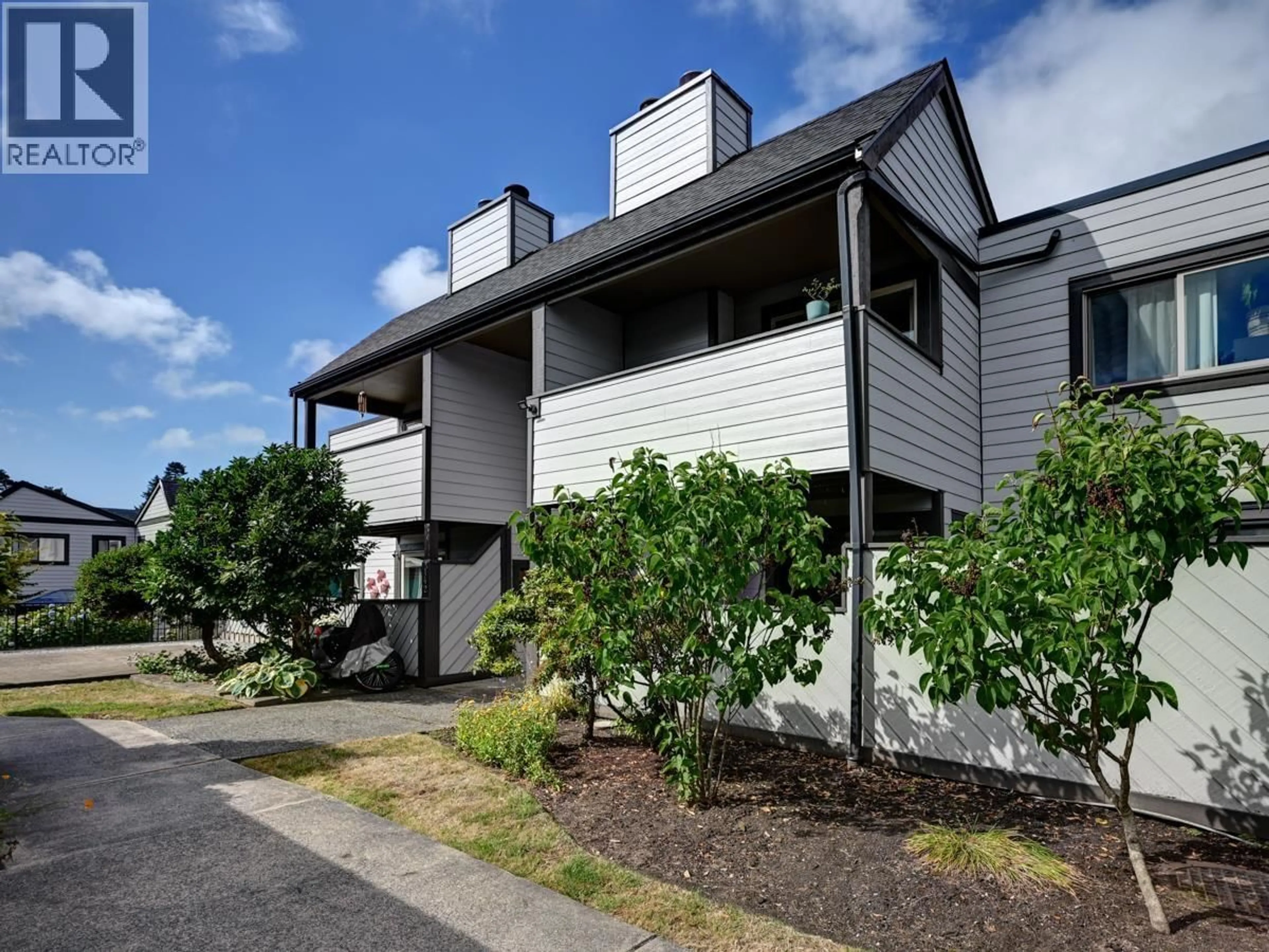 Home with vinyl exterior material, street for 144 - 5421 10 AVENUE, Delta British Columbia V4M3T9