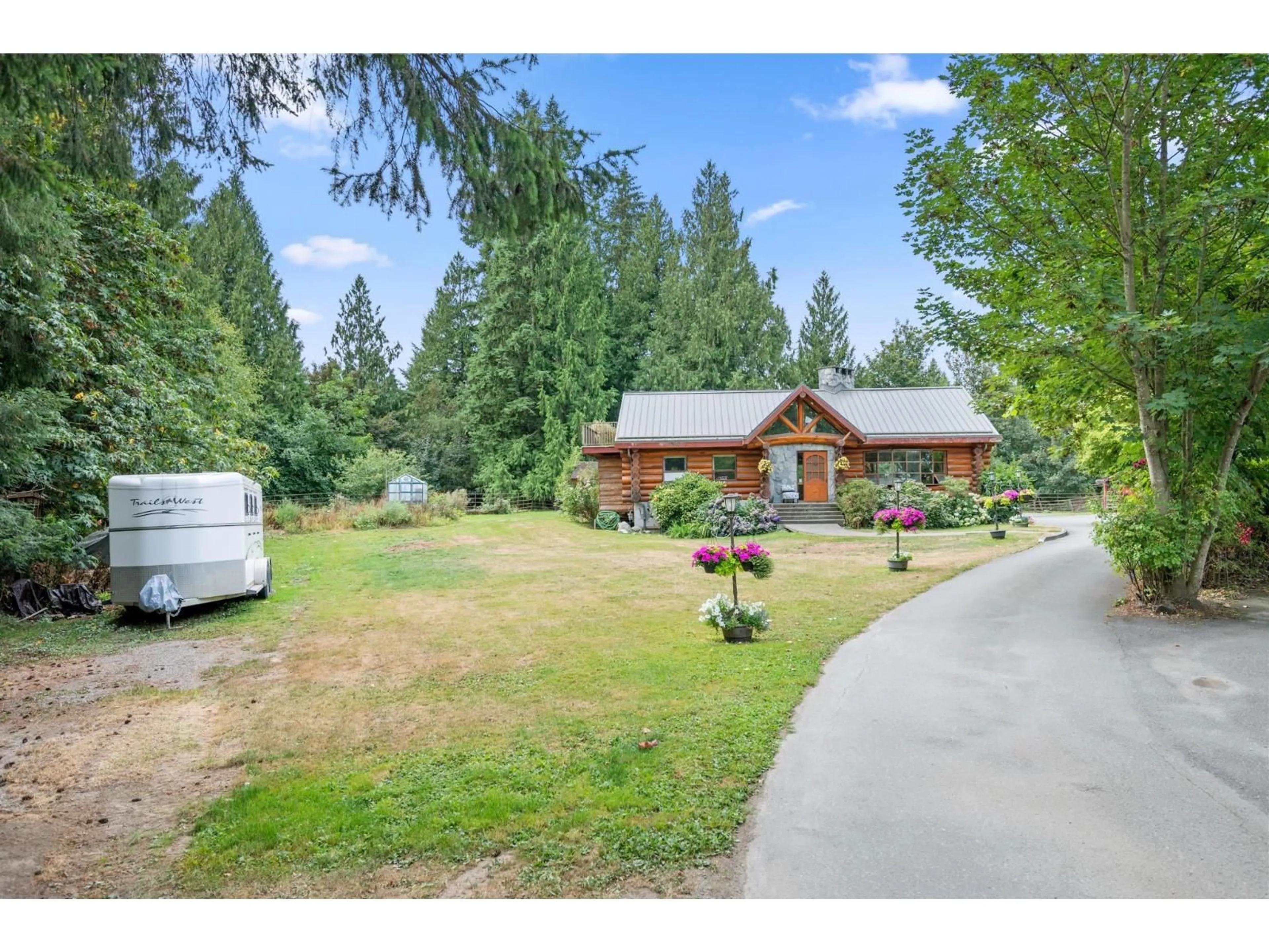 A pic from outside/outdoor area/front of a property/back of a property/a pic from drone, unknown for 7275 253 STREET, Langley British Columbia V4W1V1