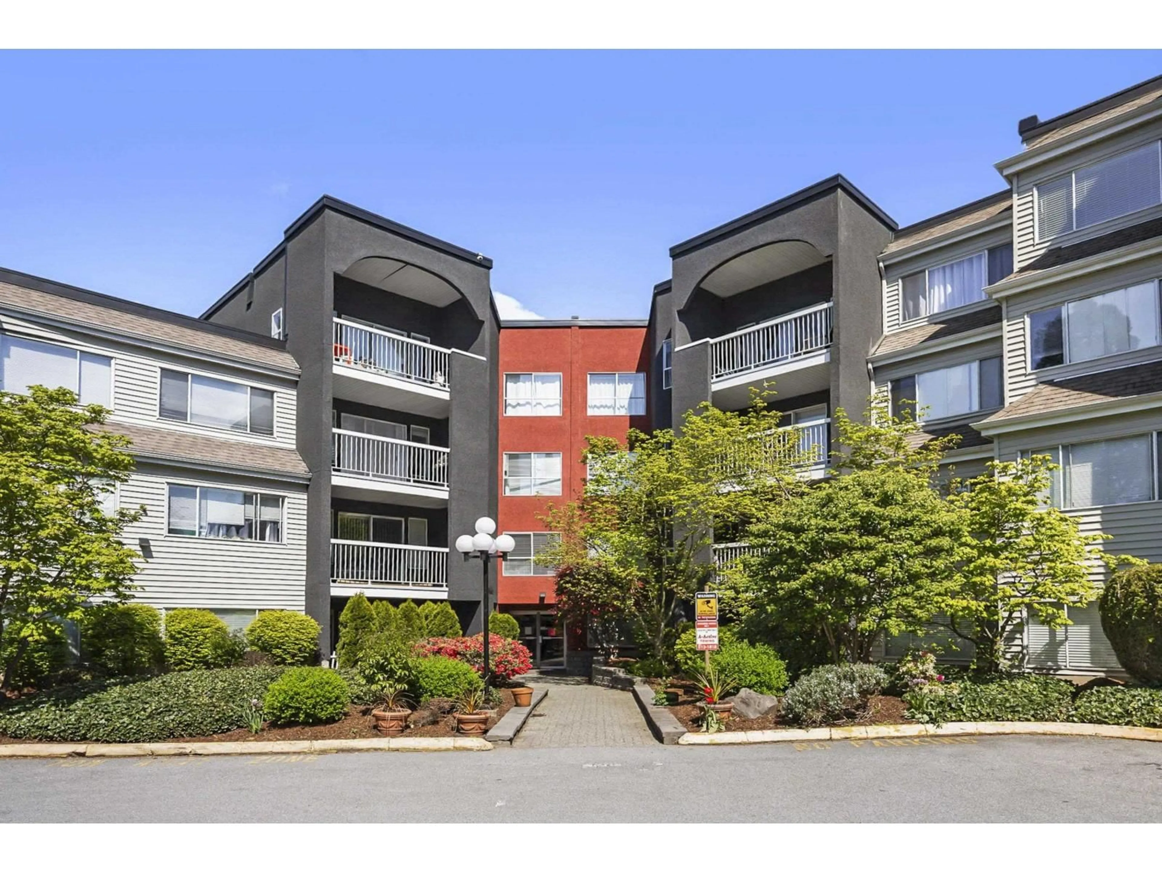 A pic from outside/outdoor area/front of a property/back of a property/a pic from drone, unknown for 312 - 5700 200 STREET, Langley British Columbia V3A7S6