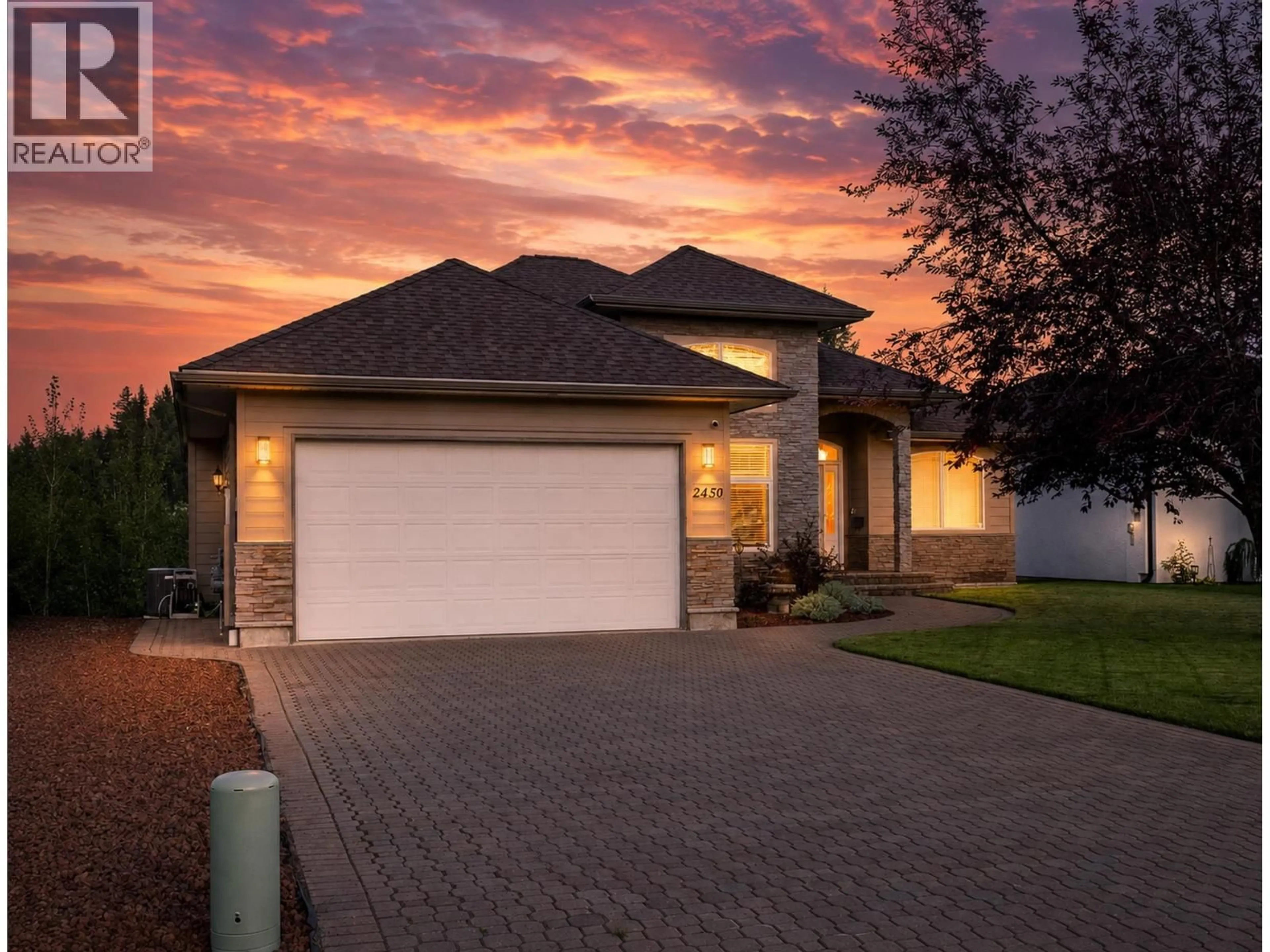 Home with brick exterior material, street for 2450 MCTAVISH ROAD, Prince George British Columbia V2K0A1