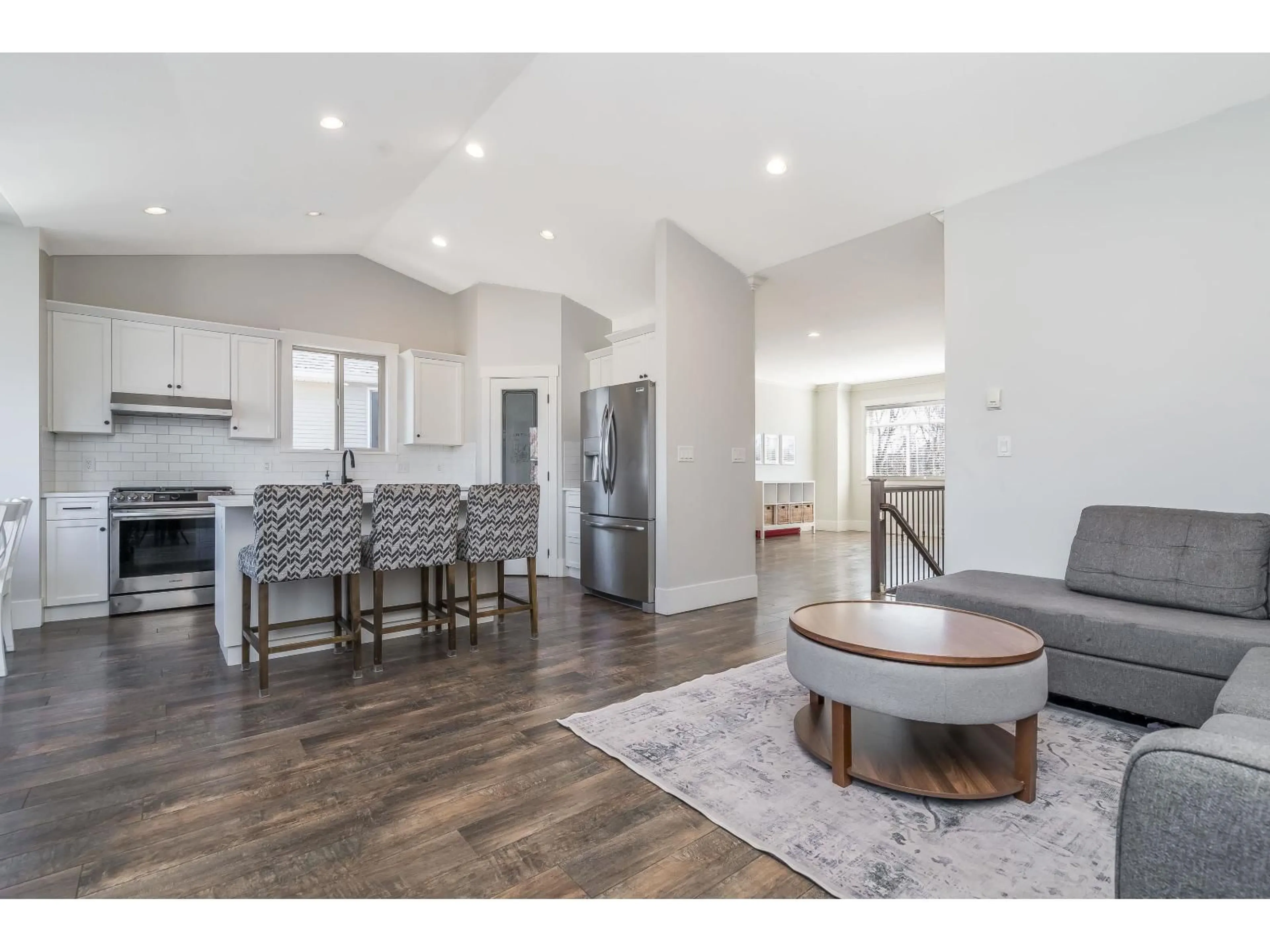 Open concept kitchen, wood/laminate floor for 34831 1 AVENUE, Abbotsford British Columbia V2S8C1