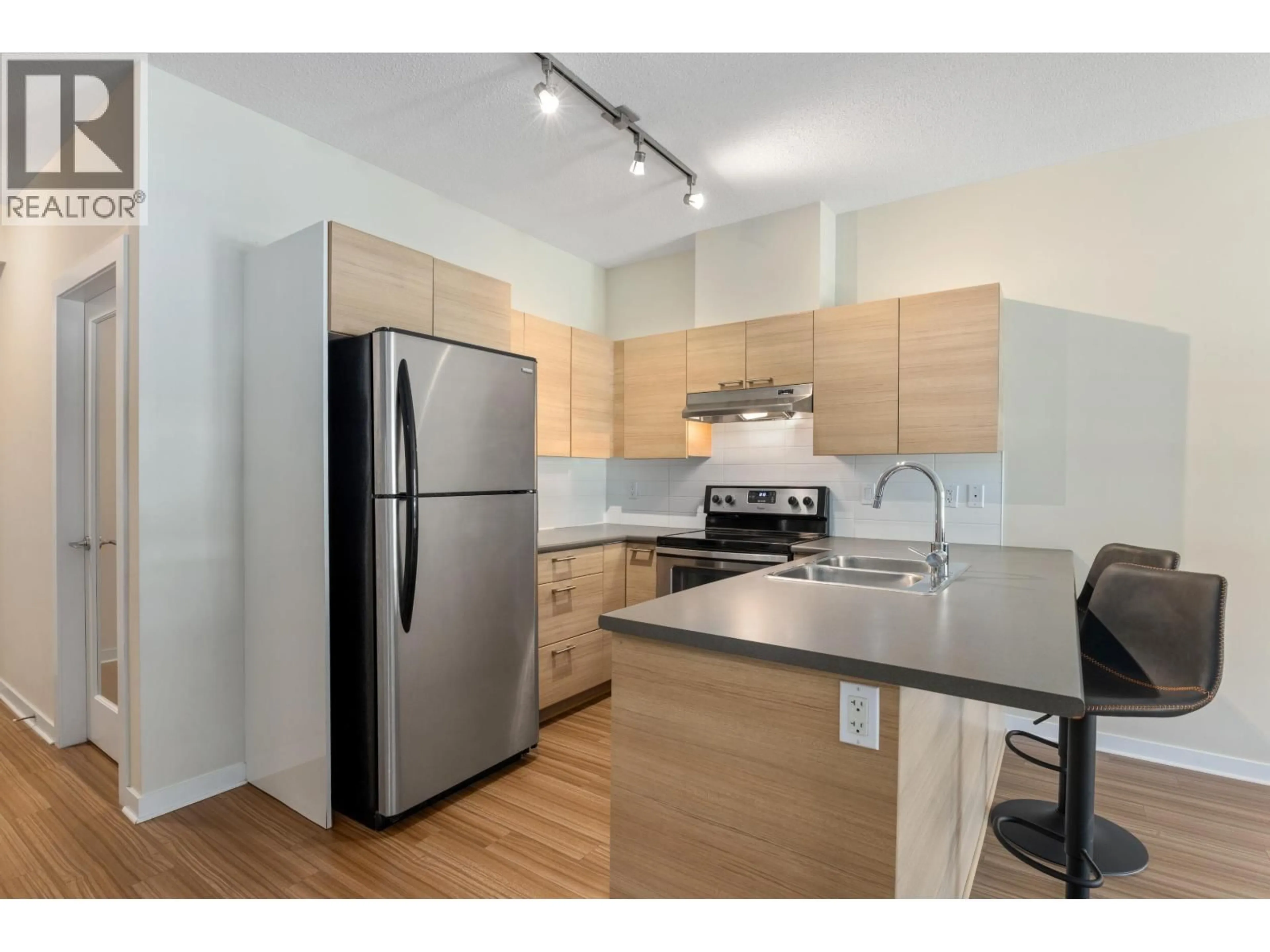 Standard kitchen, wood/laminate floor for 202 - 7445 FRONTIER STREET, Pemberton British Columbia V0N2L1
