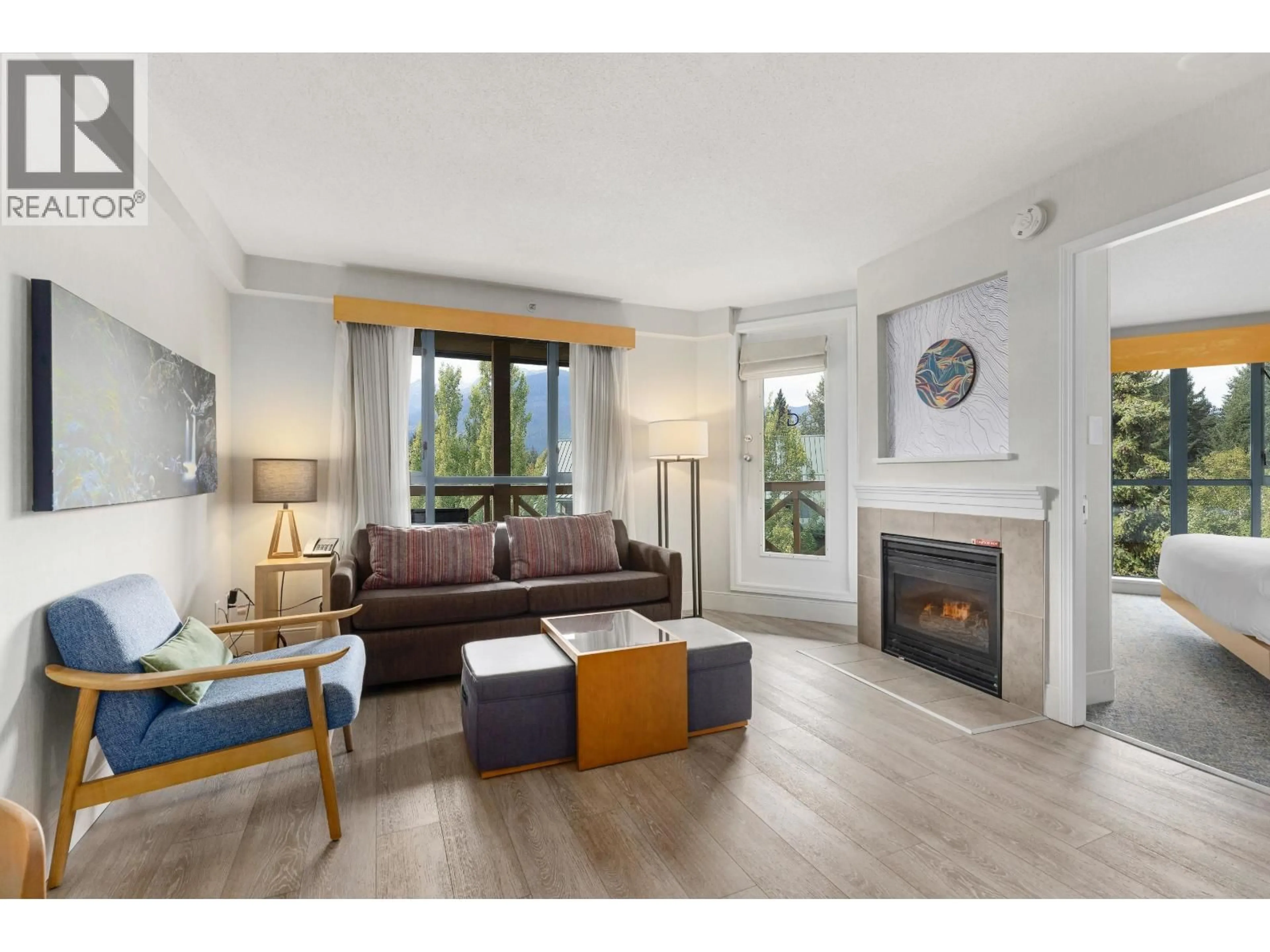 Living room with furniture, wood/laminate floor for 2416 - 4308 MAIN STREET, Whistler British Columbia V8E1A9