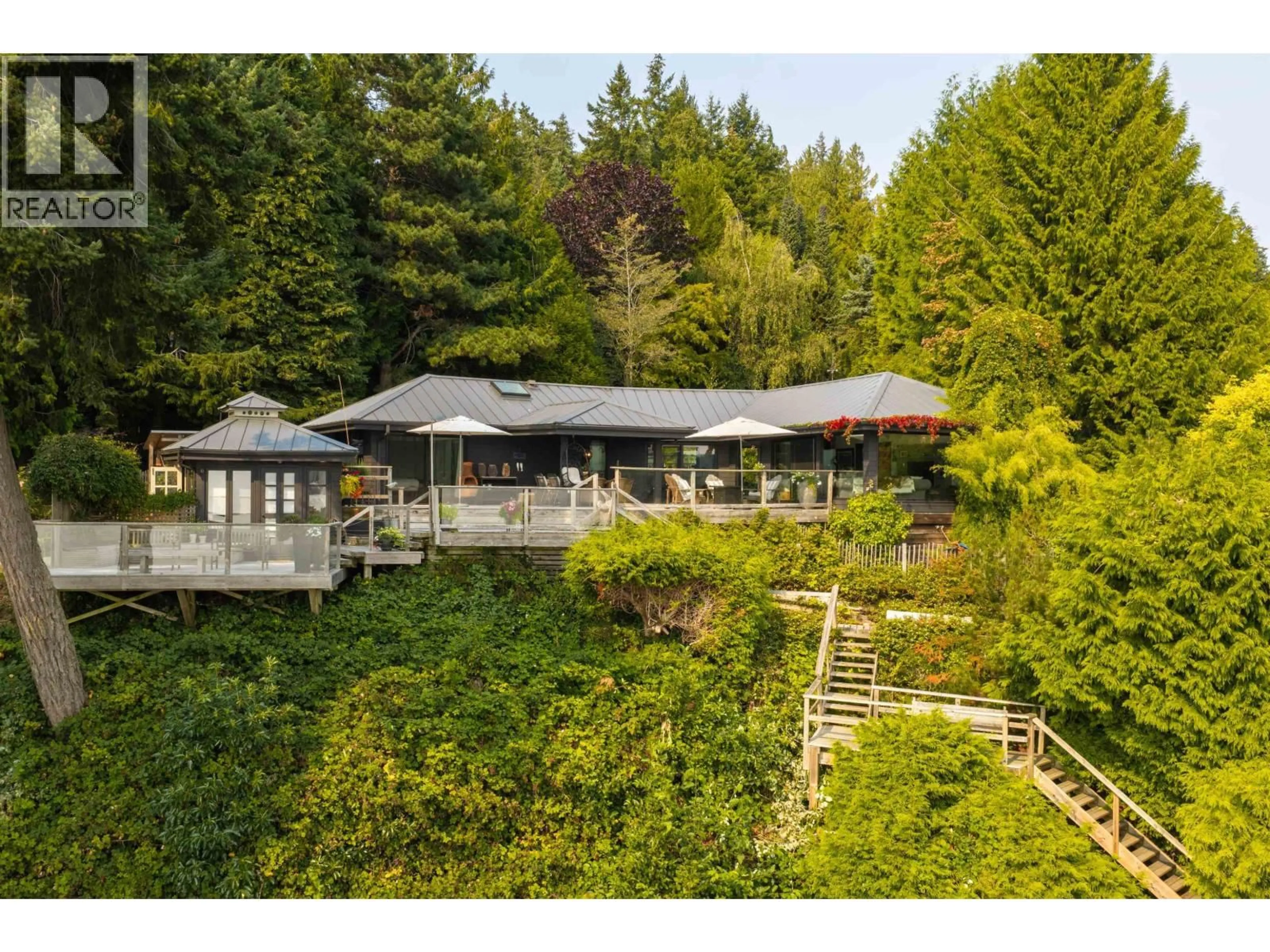 A pic from outside/outdoor area/front of a property/back of a property/a pic from drone, forest/trees view for 1801 ARBUTUS POINT ROAD, Bowen Island British Columbia V0N1G2