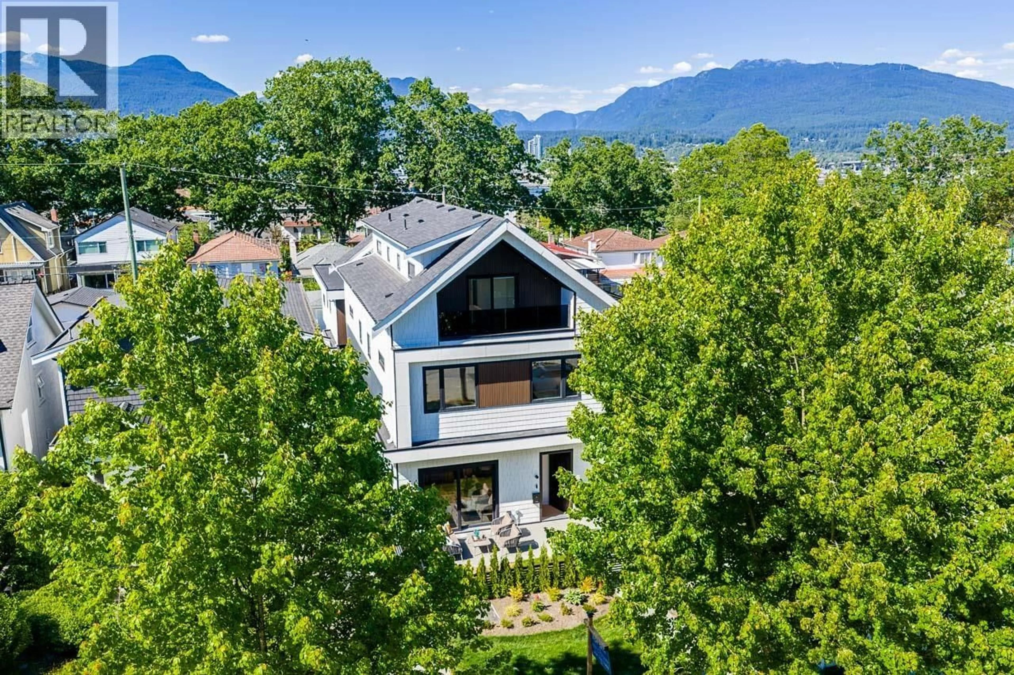 A pic from outside/outdoor area/front of a property/back of a property/a pic from drone, mountain view for 1 - 2875 CAMBRIDGE STREET, Vancouver British Columbia V5J3Z1
