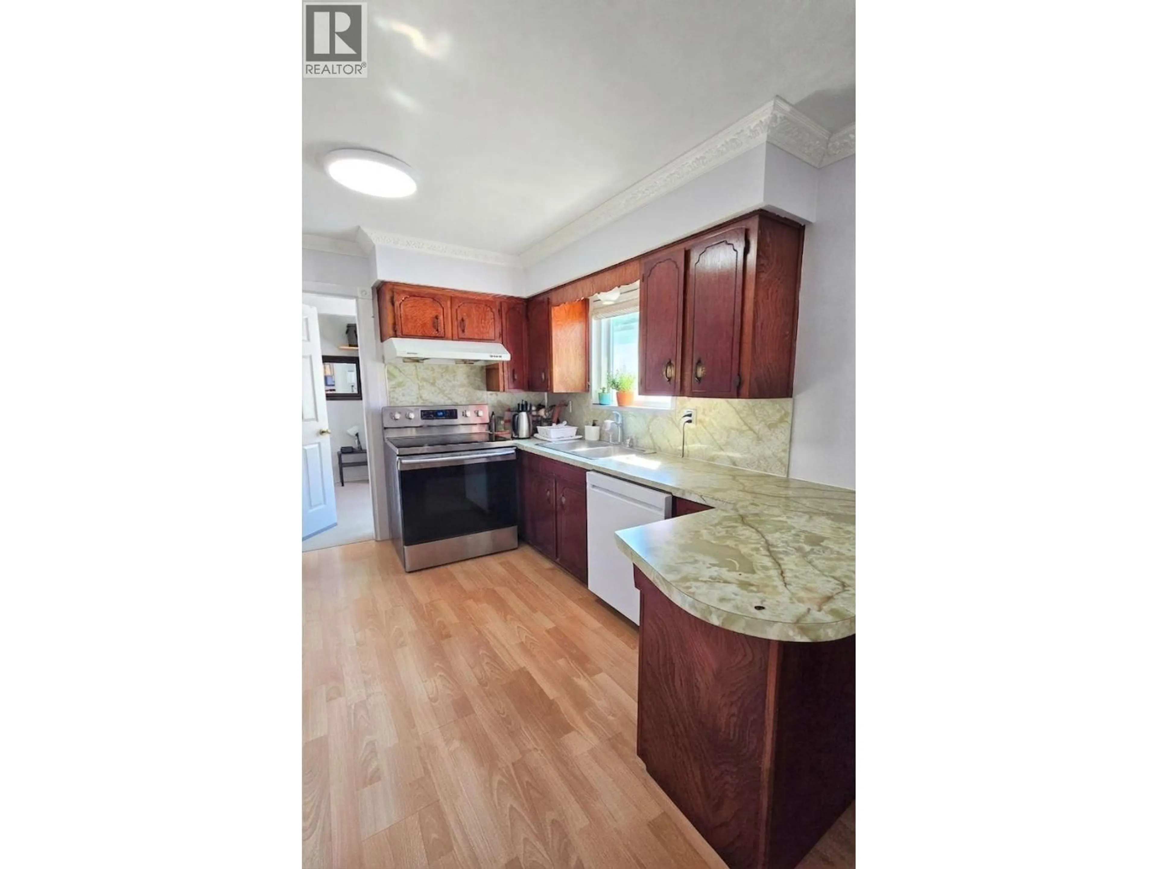 Open concept kitchen, unknown for 5075 PAYNE STREET, Vancouver British Columbia V5R4J5