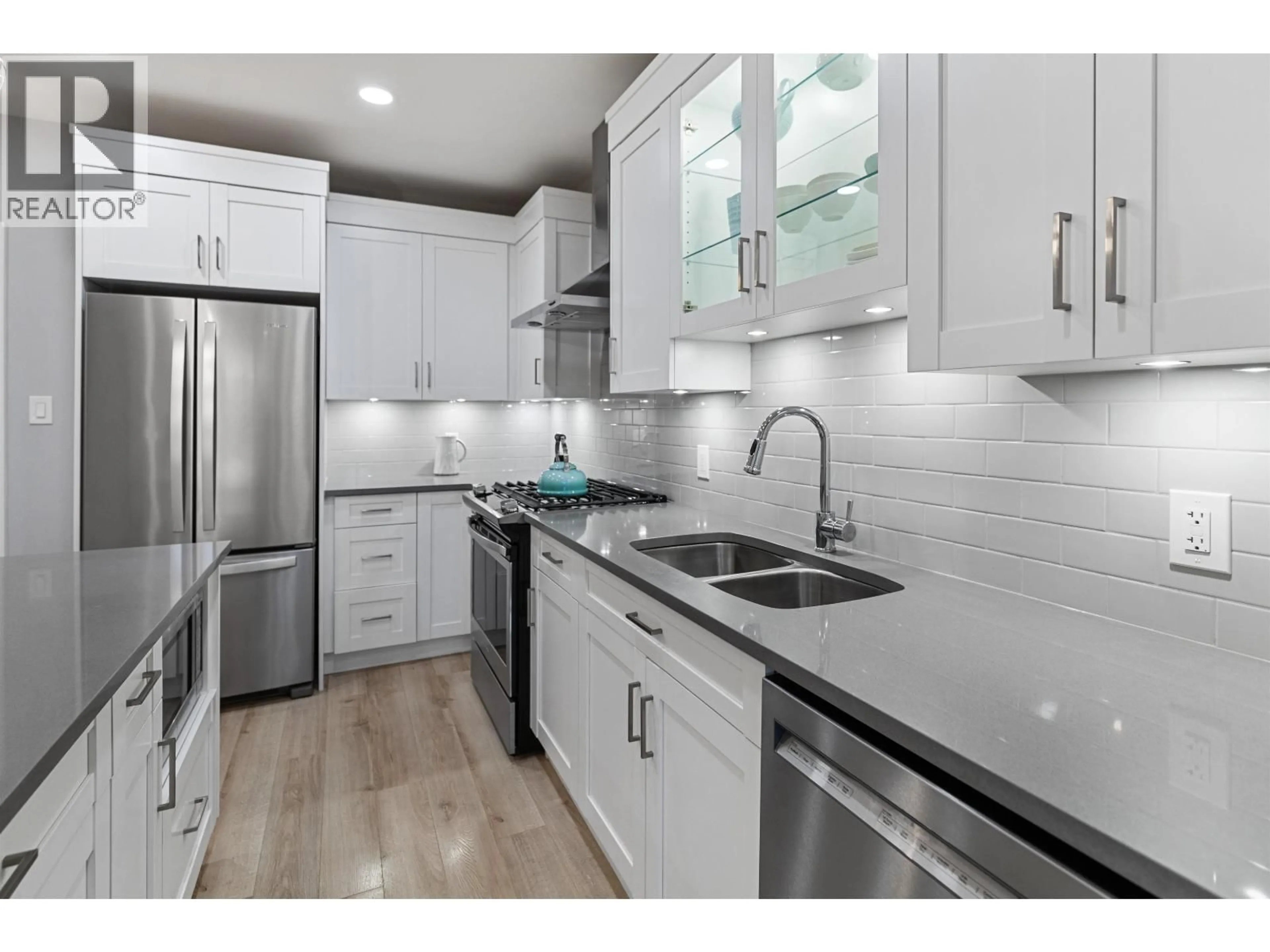 Open concept kitchen, ceramic/tile floor for 202 - 1087 6TH AVENUE, Prince George British Columbia V2L0E5