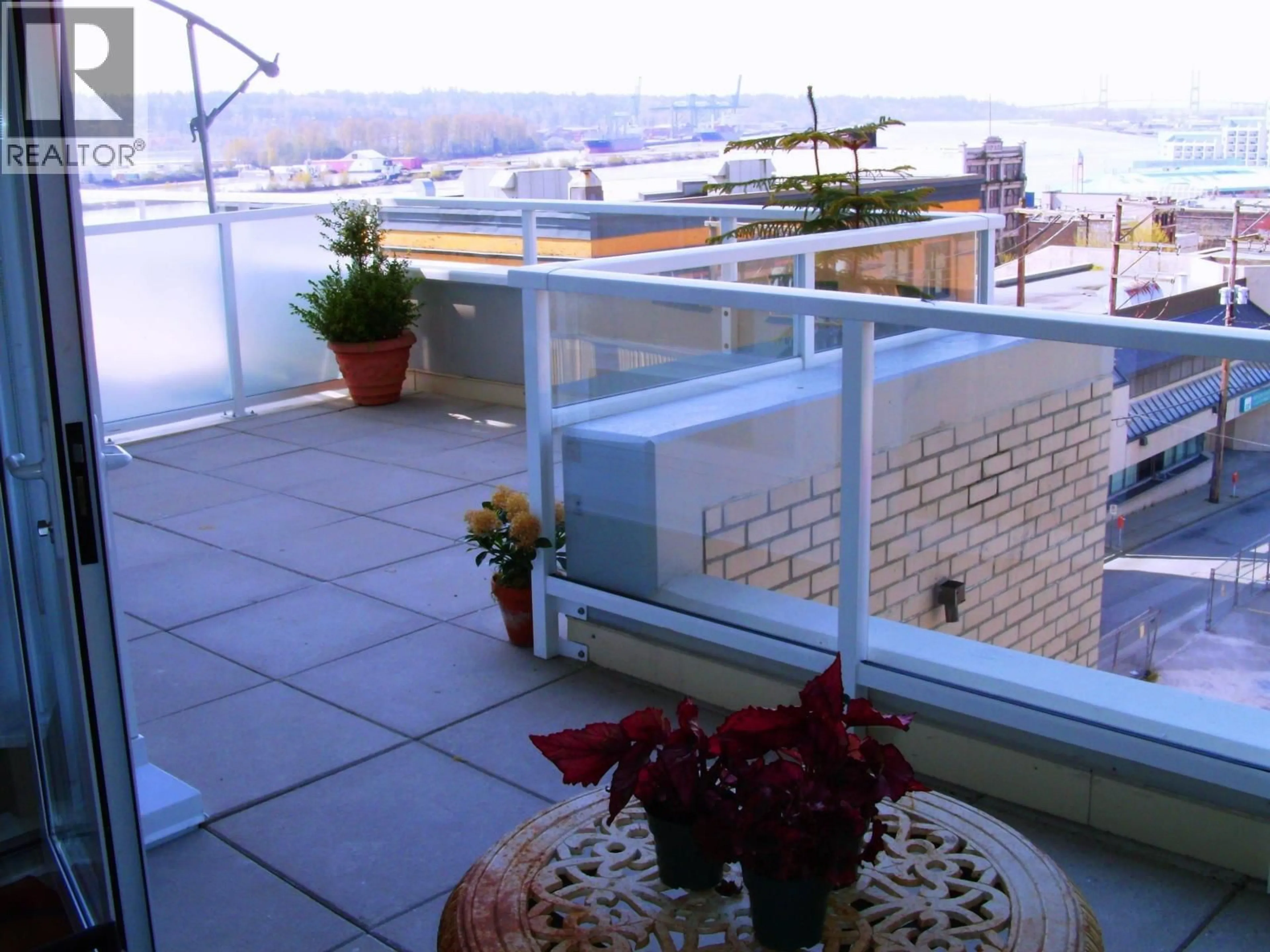 Patio, city buildings view from balcony for 506 - 39 SIXTH STREET, New Westminster British Columbia V3L0B3