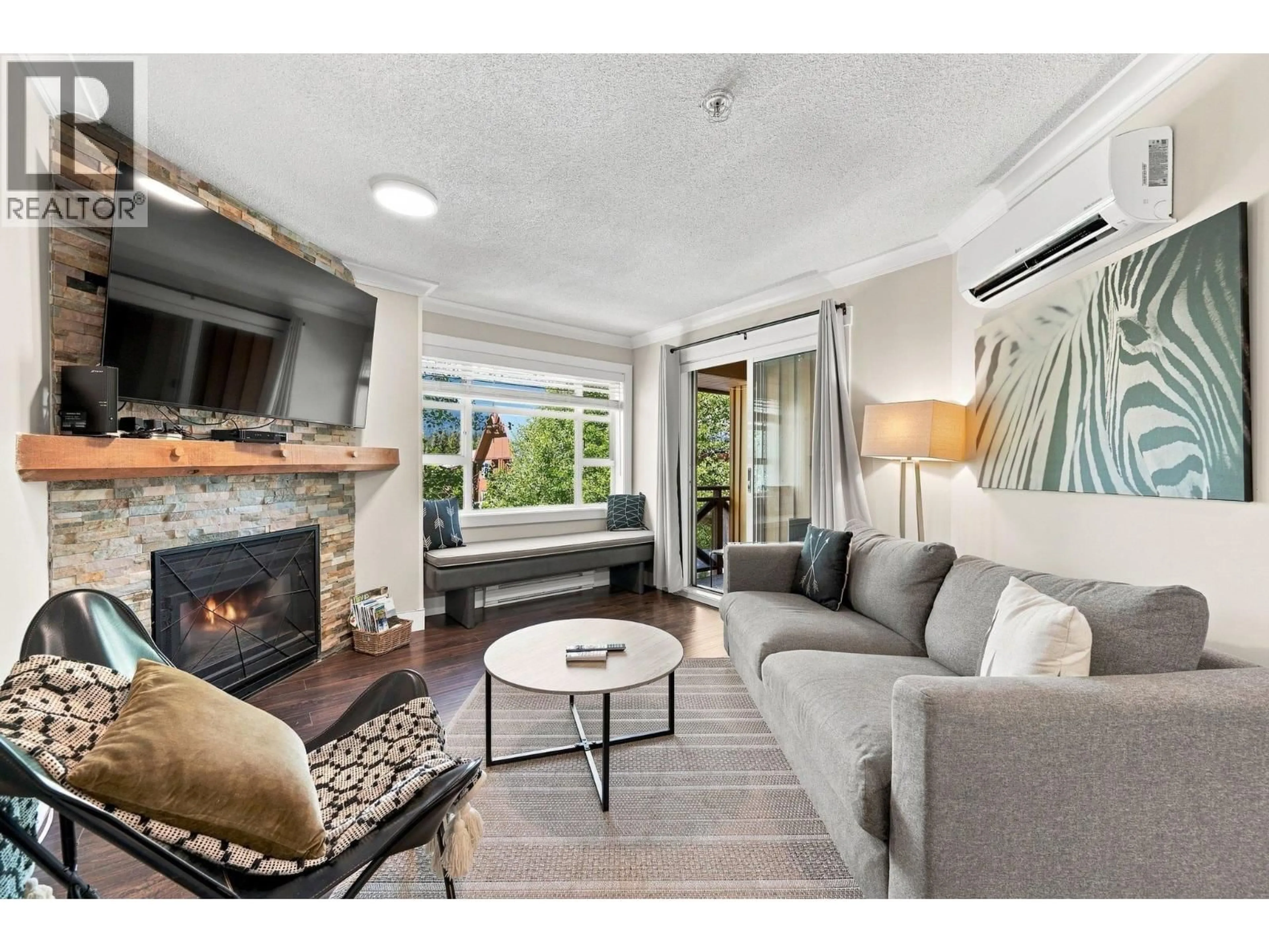 Living room with furniture, unknown for 324 - 4360 LORIMER ROAD, Whistler British Columbia V8E1A5