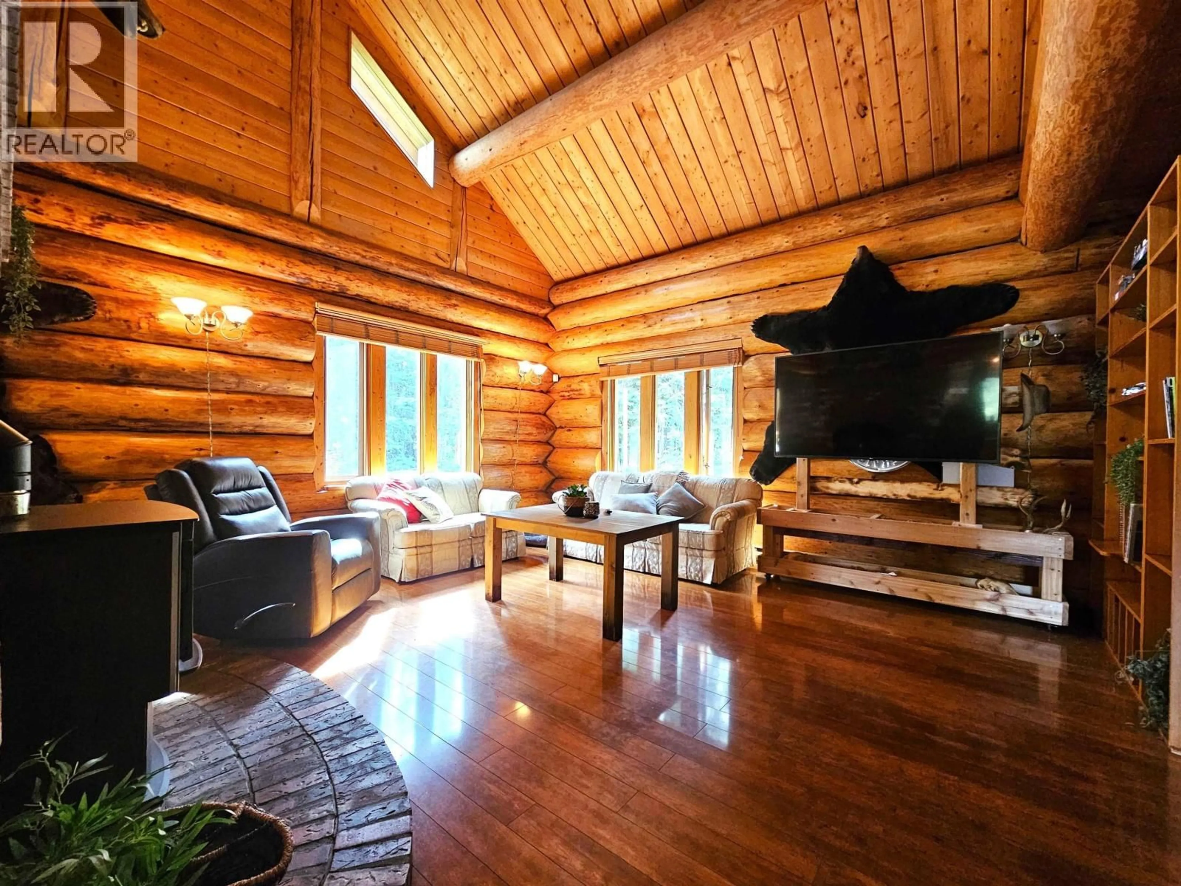 Living room with furniture, wood/laminate floor for 9070 MOUNTAINVIEW ROAD, Prince George British Columbia V2N0B1