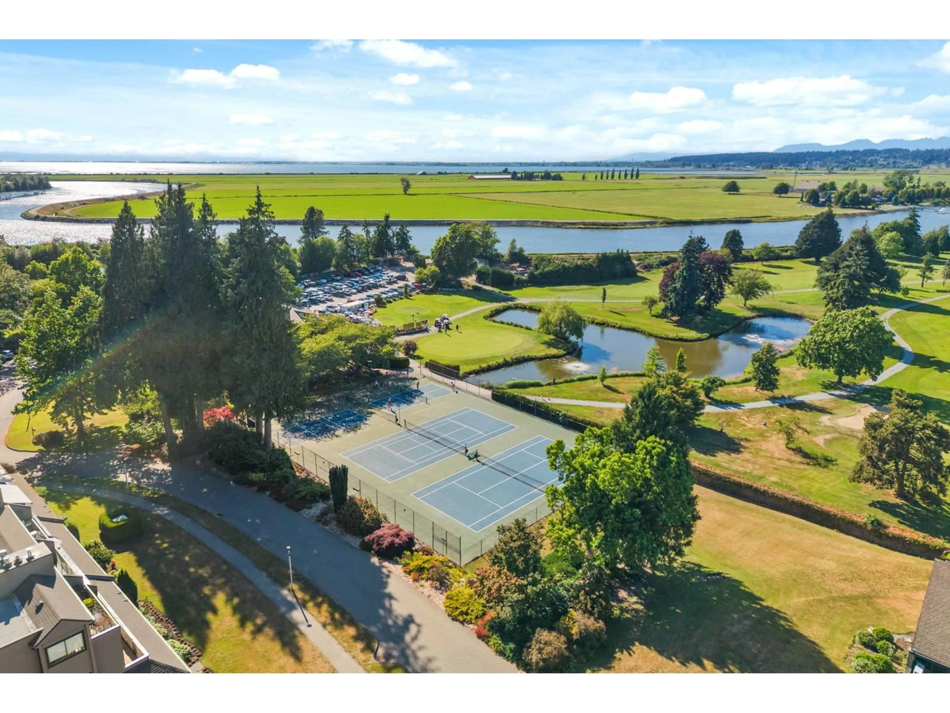 A pic from outside/outdoor area/front of a property/back of a property/a pic from drone, water/lake/river/ocean view for 4 - 14025 NICO WYND PLACE, Surrey British Columbia V4P1J2