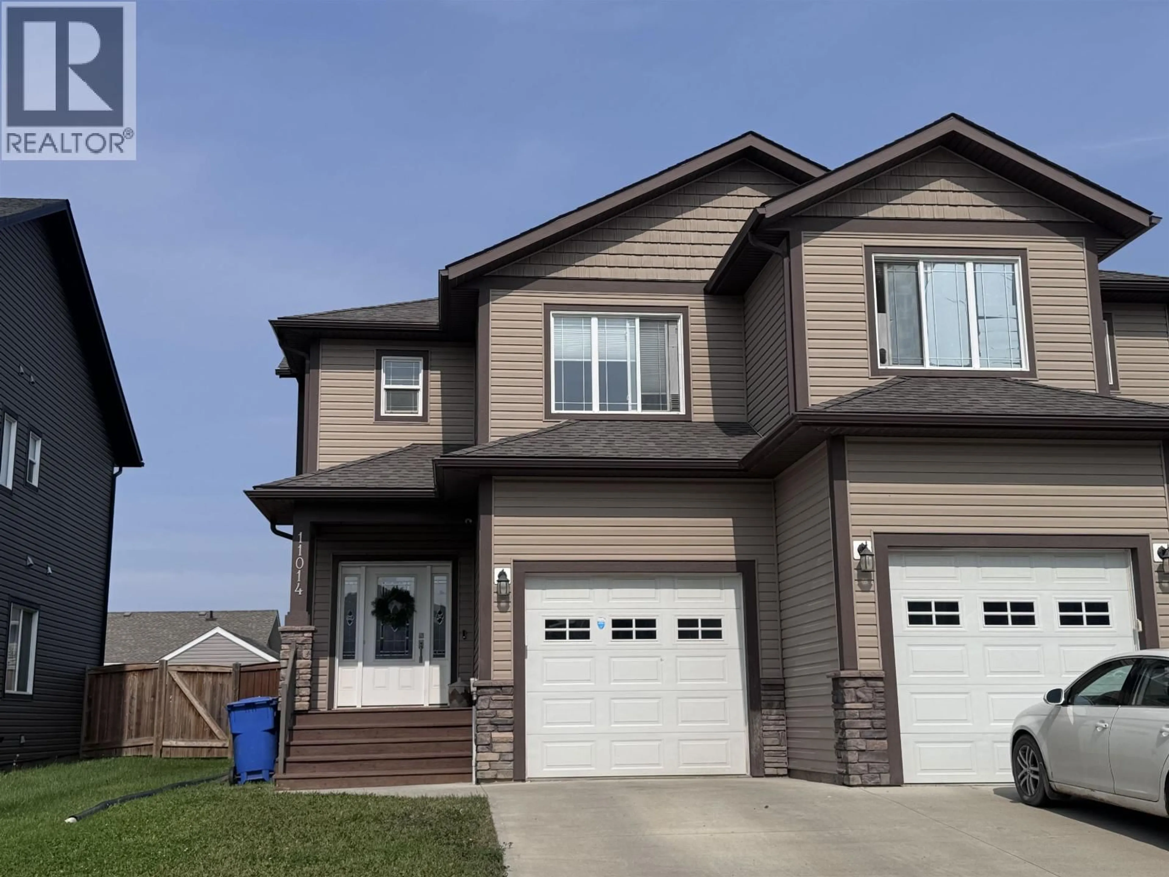 Home with vinyl exterior material, street for 11014 104A AVENUE, Fort St. John British Columbia V1J0J3