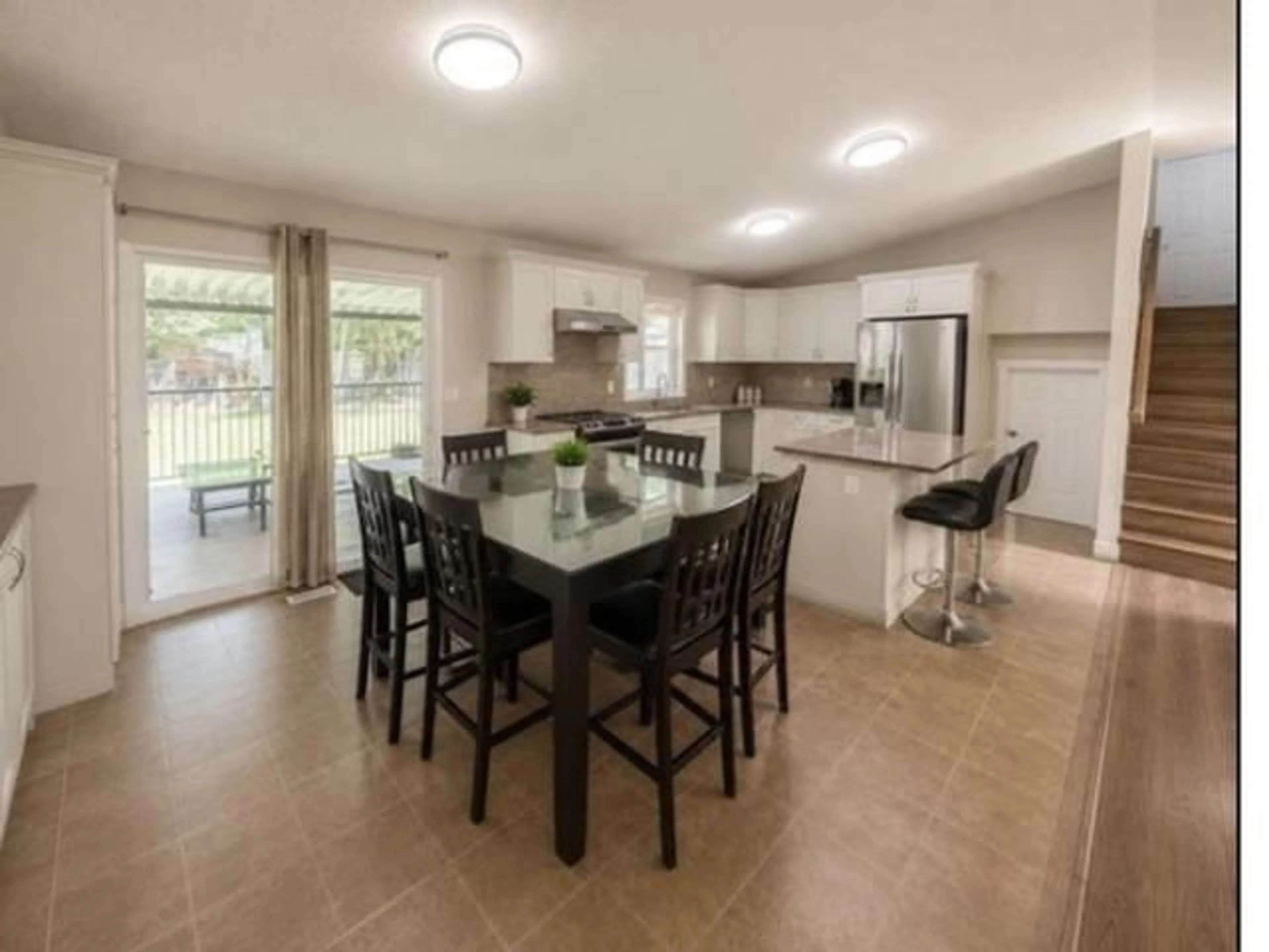 Open concept kitchen, ceramic/tile floor for 14565 91A AVENUE, Surrey British Columbia V3R7K6