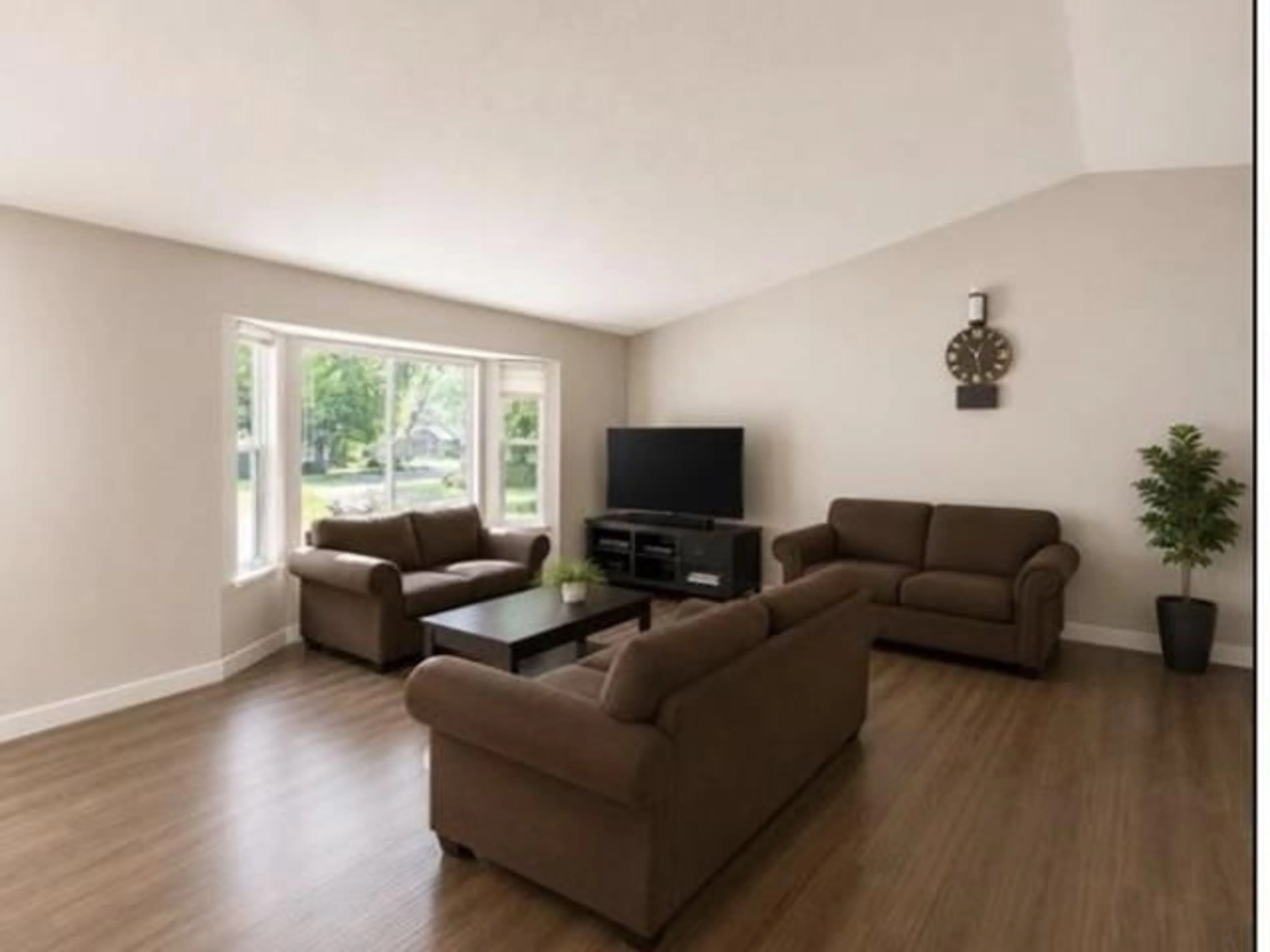 Living room with furniture, wood/laminate floor for 14565 91A AVENUE, Surrey British Columbia V3R7K6