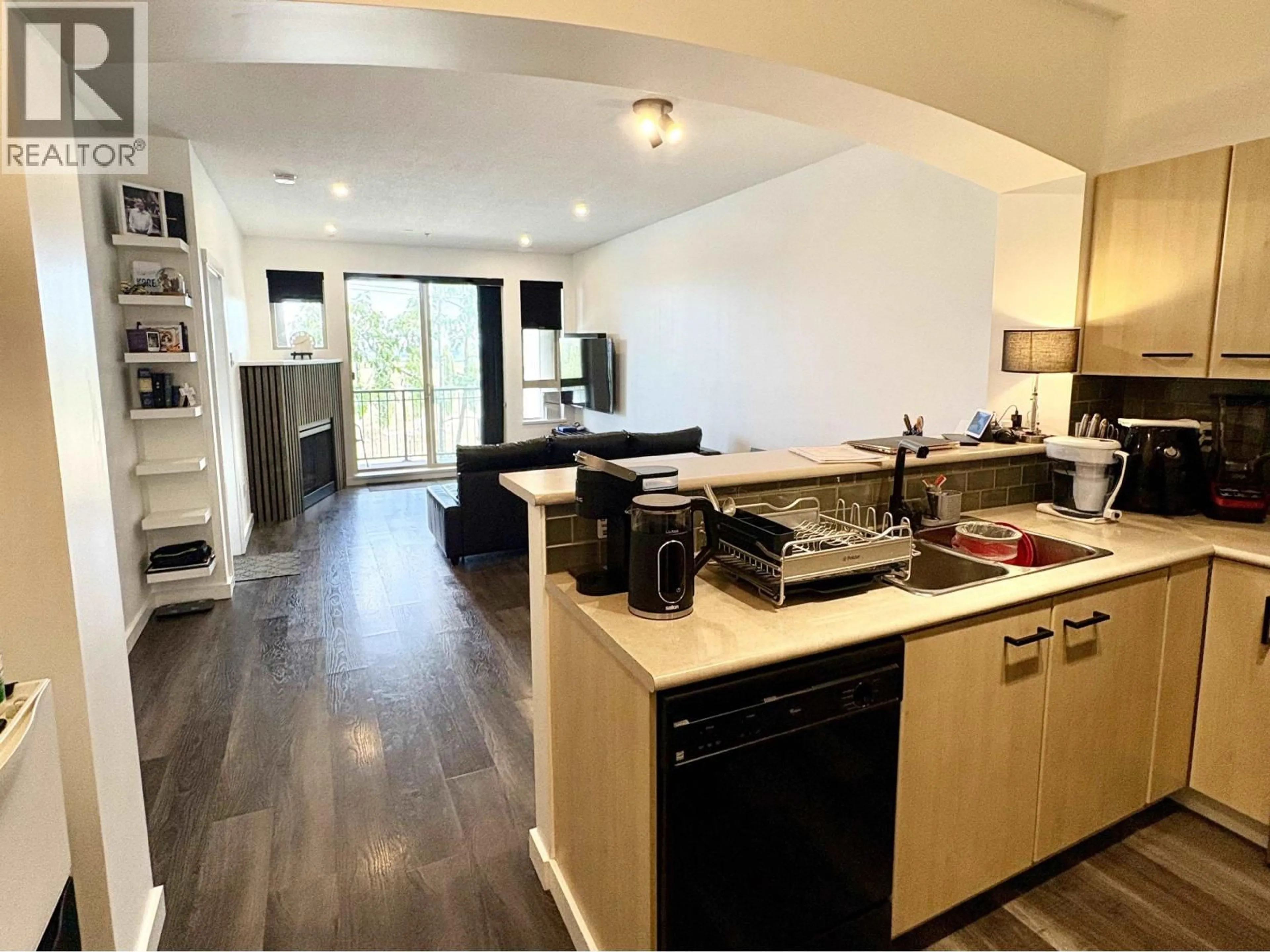 Open concept kitchen, wood/laminate floor for 1415 - 5115 GARDEN CITY ROAD, Richmond British Columbia V6X4H6