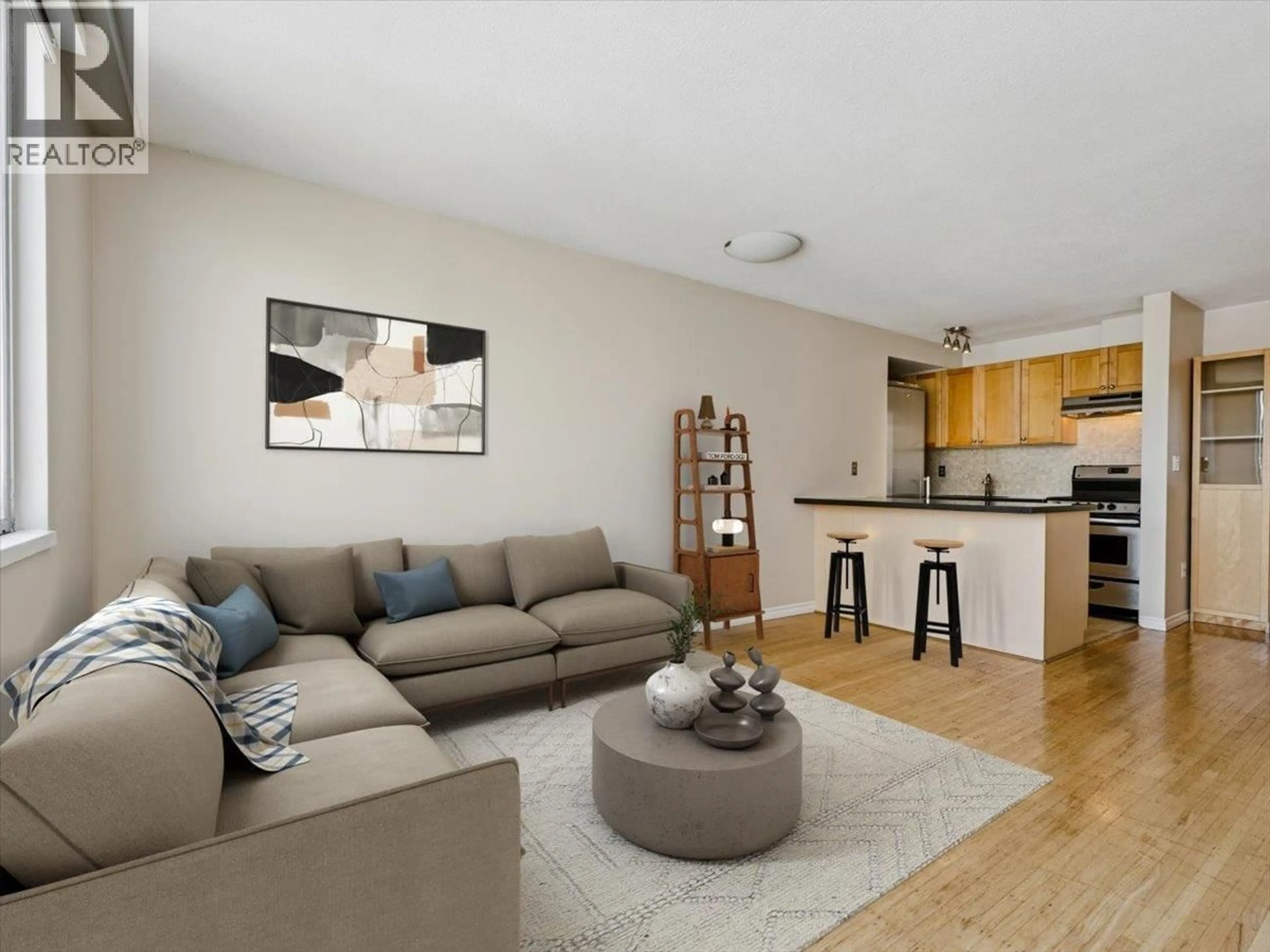 Living room with furniture, wood/laminate floor for 1105 - 1250 BURNABY STREET, Vancouver British Columbia V6E1P5