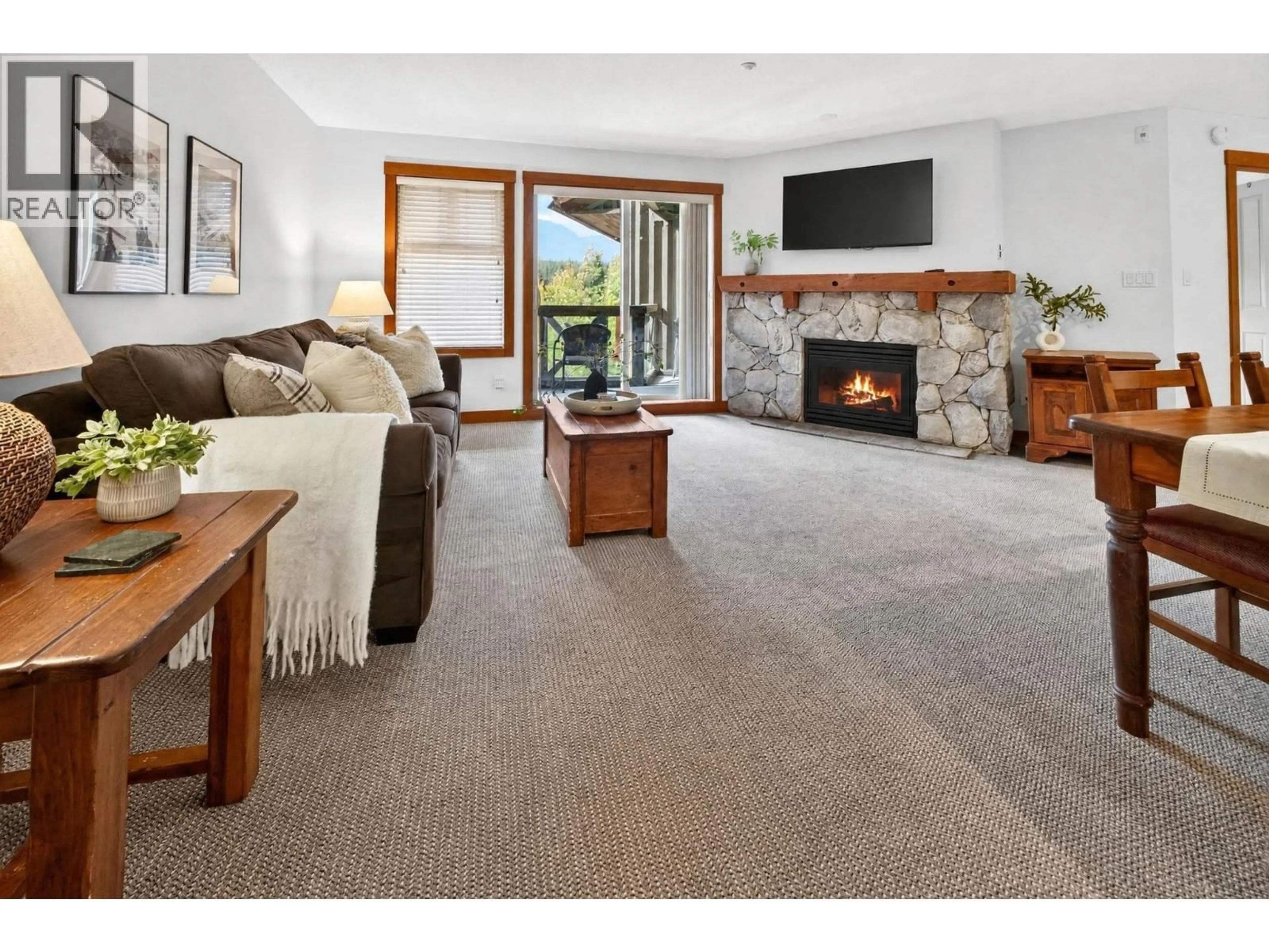 Living room with furniture, carpet floor for 409 - 4660 BLACKCOMB WAY, Whistler British Columbia V0N1B4