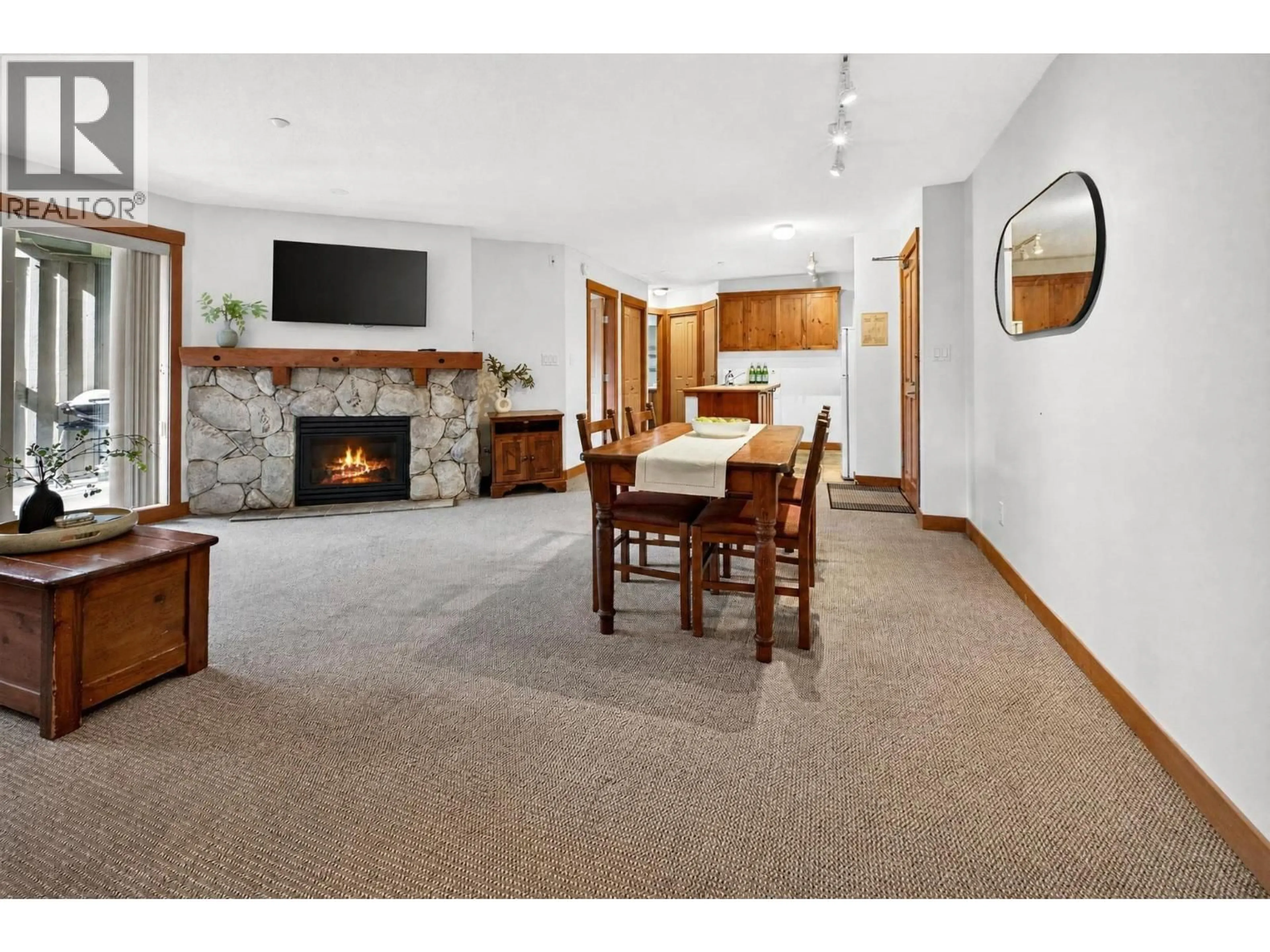 Living room with furniture, unknown for 409 - 4660 BLACKCOMB WAY, Whistler British Columbia V0N1B4