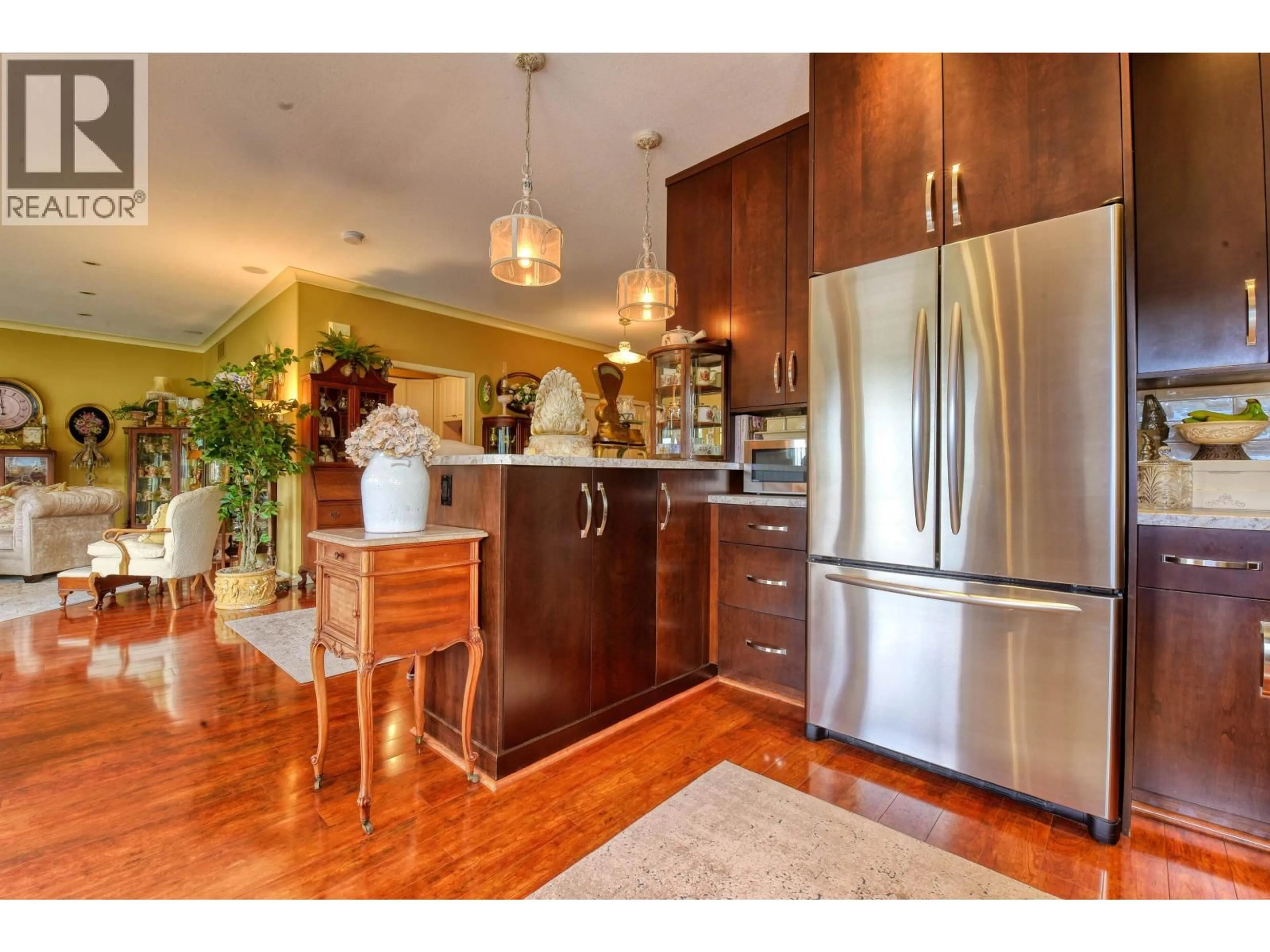 Open concept kitchen, wood/laminate floor for 1515 DUNCAN ROAD, Williams Lake British Columbia V2G5K5
